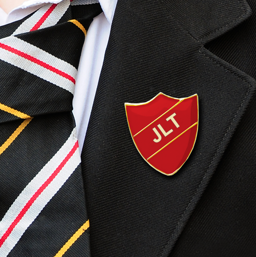 JLT school badge shield shape red