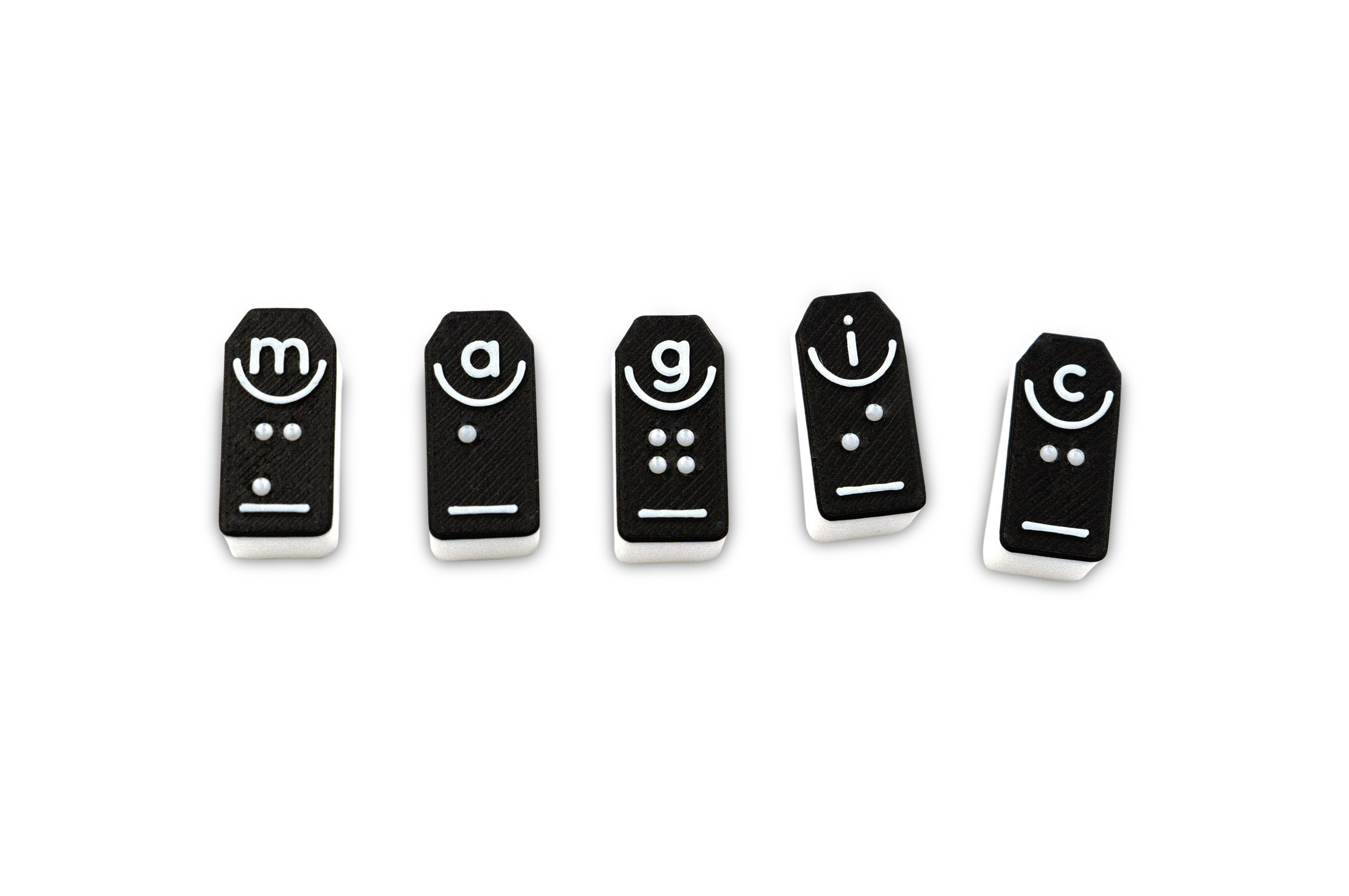 Tactonom Magic Braille letter tiles, tiles shown are m, a, g, i, c