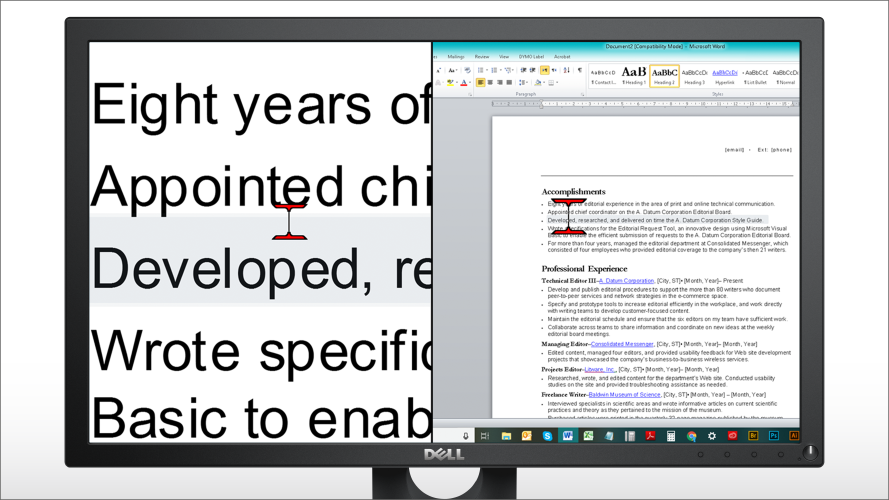 A monitor screen shown with magnification software enlarging a paragraph of text on a document on the left side of the screen while displaying the standard sized document on the right of the screen