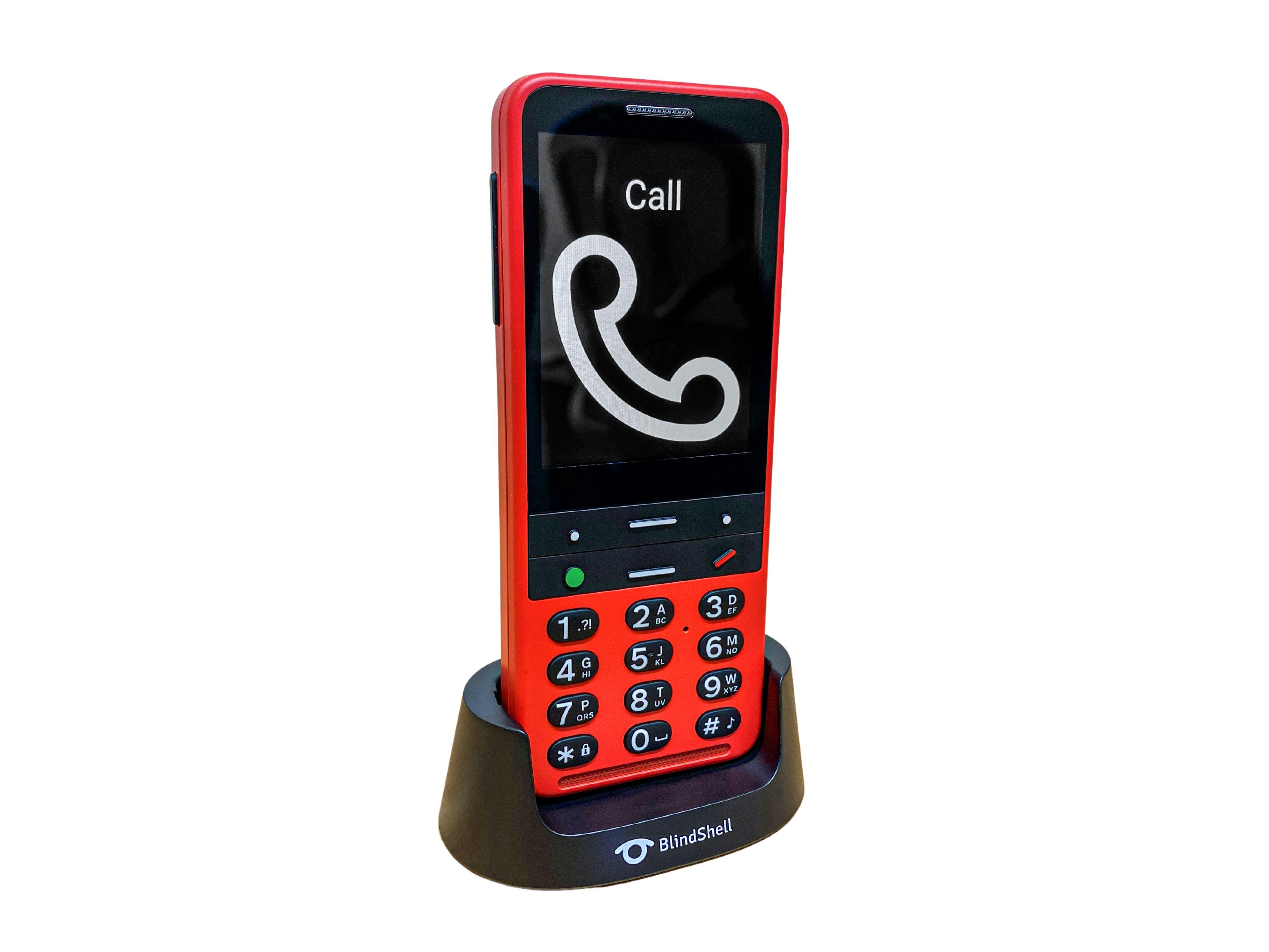 BlindShell Classic 2 in red shown in its cradle and with the screen showing call