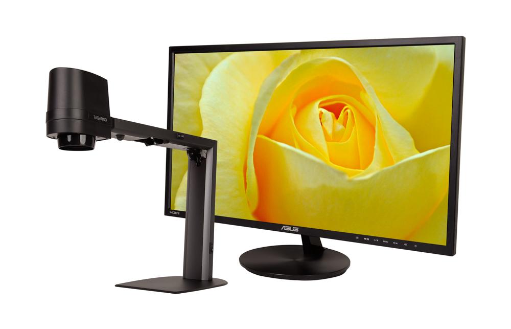 Tagarno IBIS Full HD Special in front of a monitor magnifying a flower