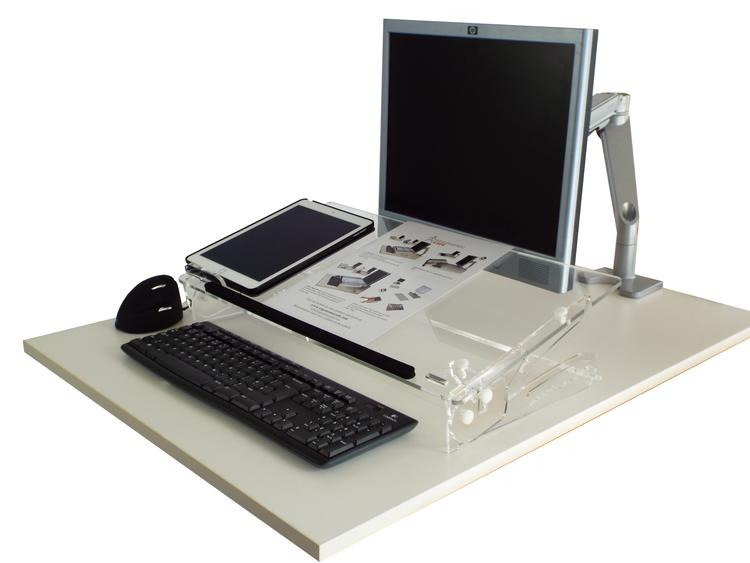 Go Flex Document Holder on a desk with a tablet and document sat on the doucument holder on the desk is a monitor, keyboard and mouse