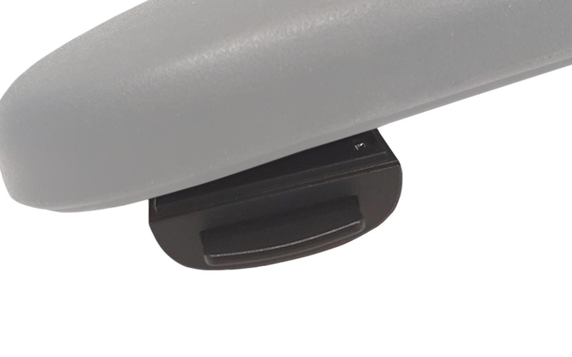 Image of the soft touch button this is located on the inner side of the armrest