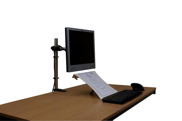 U Turn Document Holder in the document holding position on a desk with a monitor, keyboard and mouse