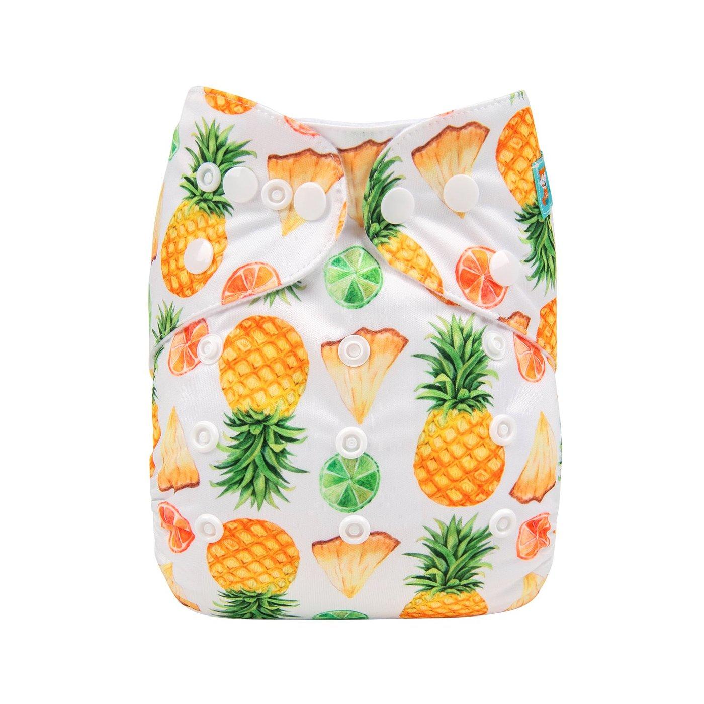 White pocket nappy with whole pineapples, segements of pineapple and halved limes pattern