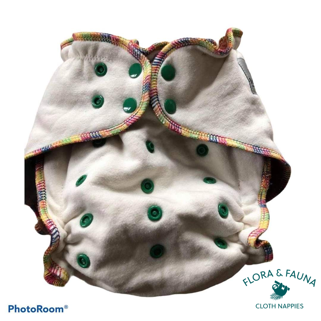 cream coloured with green poppers cloth nappy