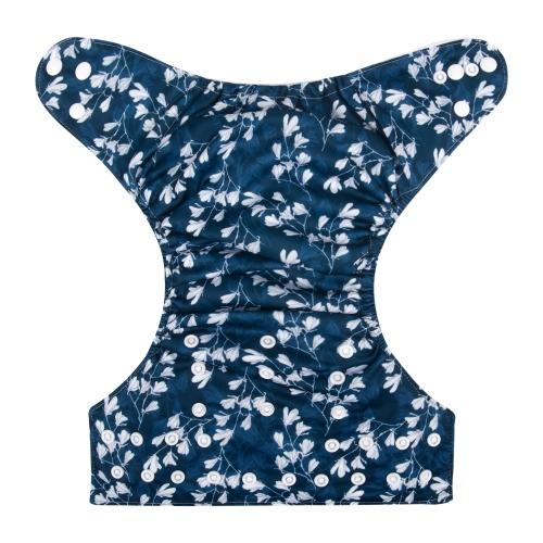 Dark blue pocket nappy with a small white magnolia shaped flowers laid out flat