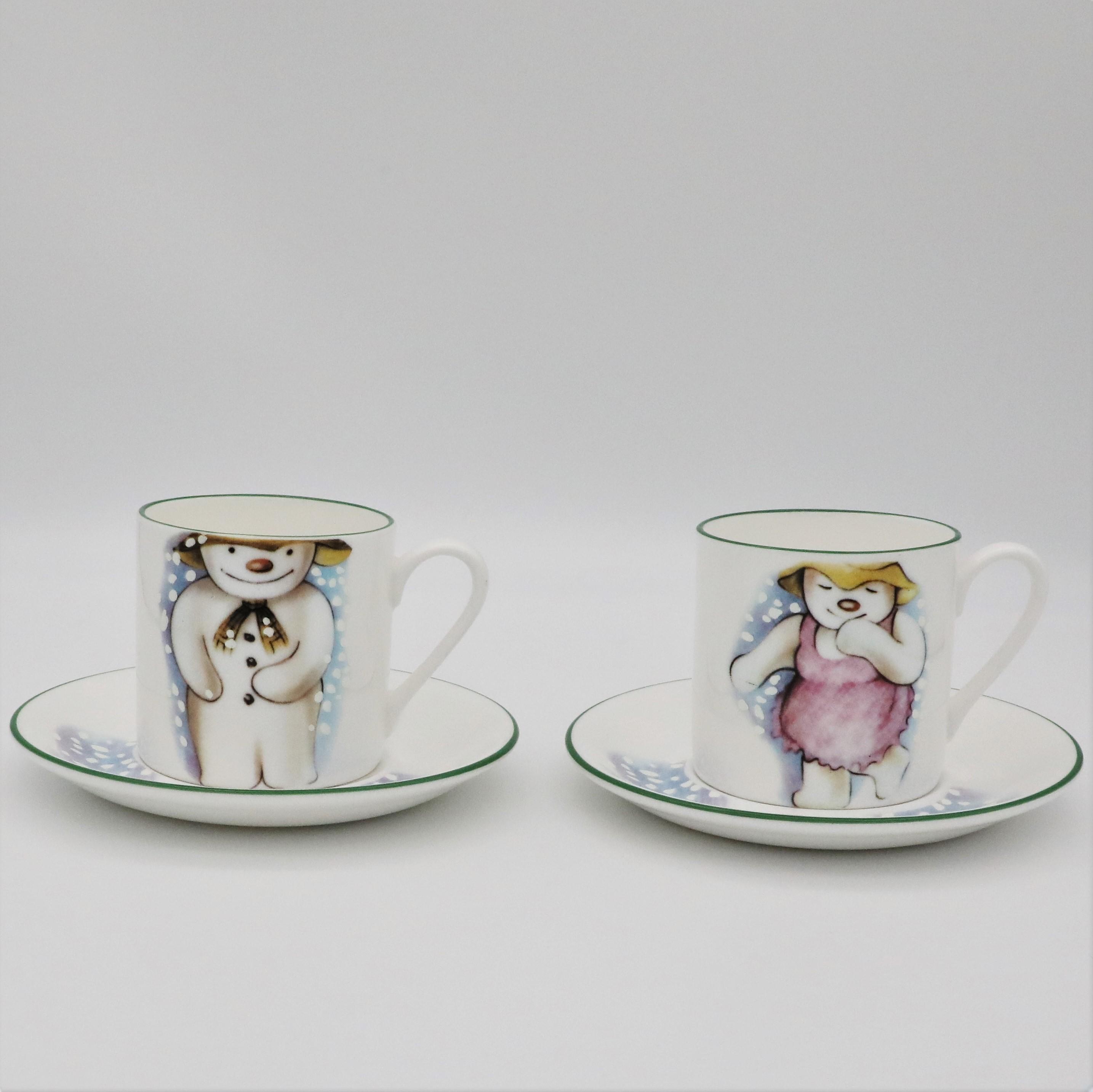 Royal Doulton Prototype Pair of Snowman and Snowlady Coffee Cups and Saucers - front