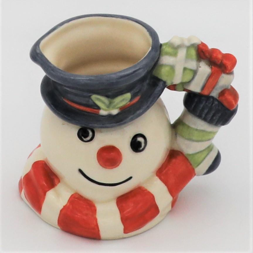 Royal Doulton D7124 Snowman Character Jug with Stocking and Parcels Handle - front