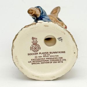Royal Doulton Bunnykins figure - DB123 Soccer Playerin Blue and White - base