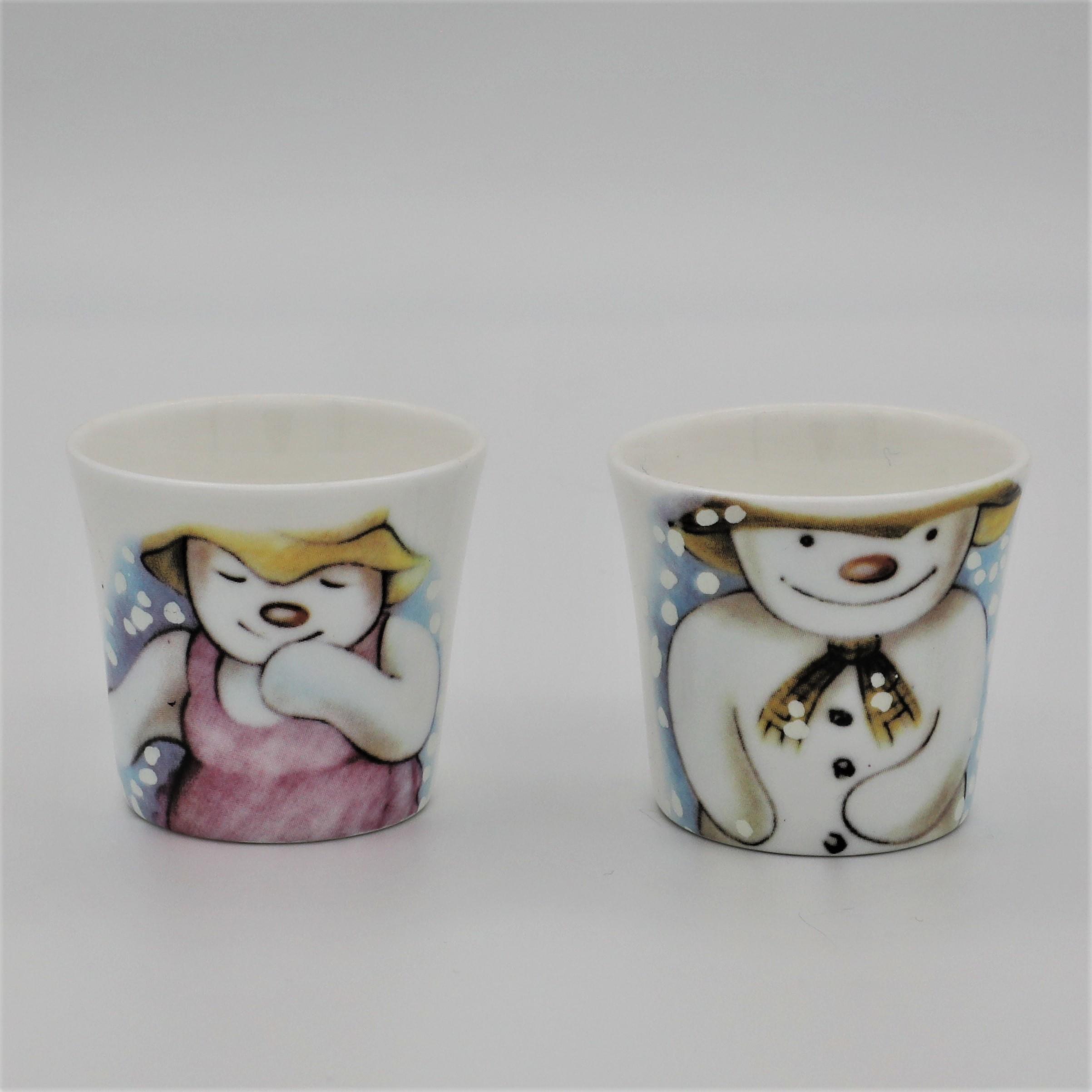 Pair Royal Doulton Snowman and Snowlady Egg Cups - Front