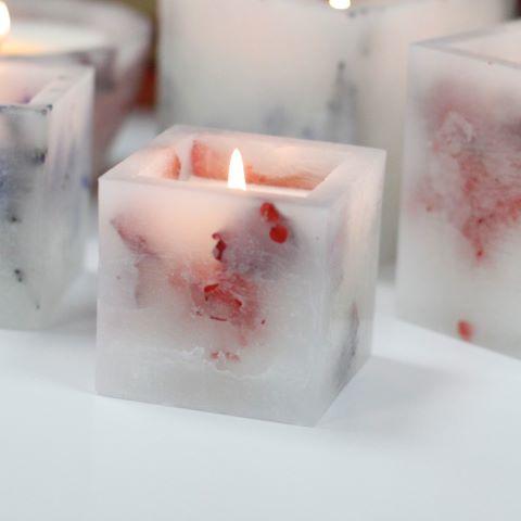 Rose  candle in a small square jar