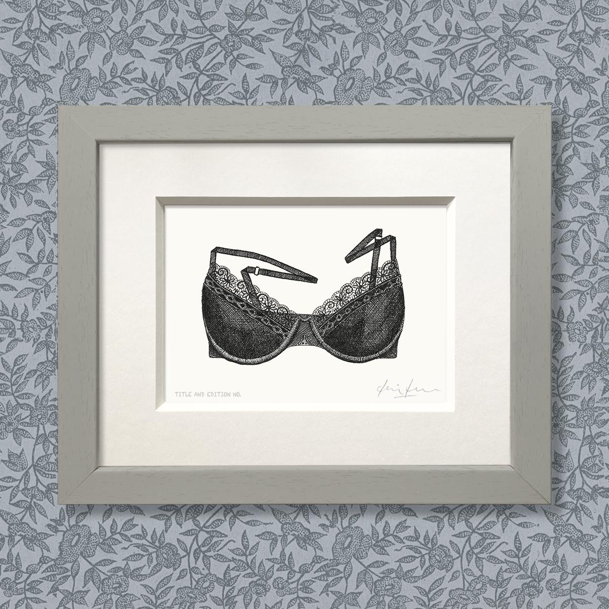 Limited edition print from pen and ink drawing of a lacy bra in a grey frame