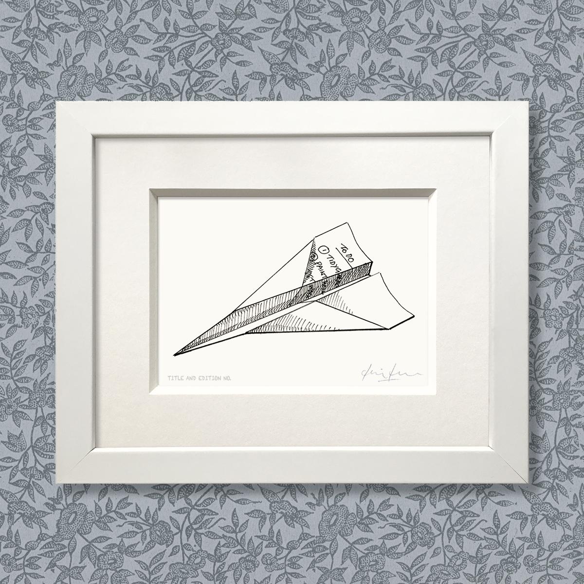 Limited edition print from a pen and ink drawing of a to-do list folded into a paper aeroplane in a white frame