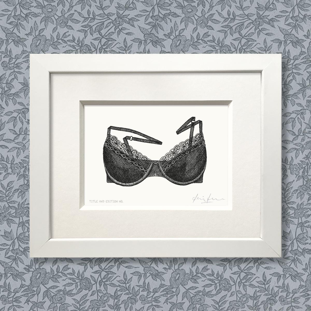 Limited edition print from pen and ink drawing of a lacy bra in a white frame