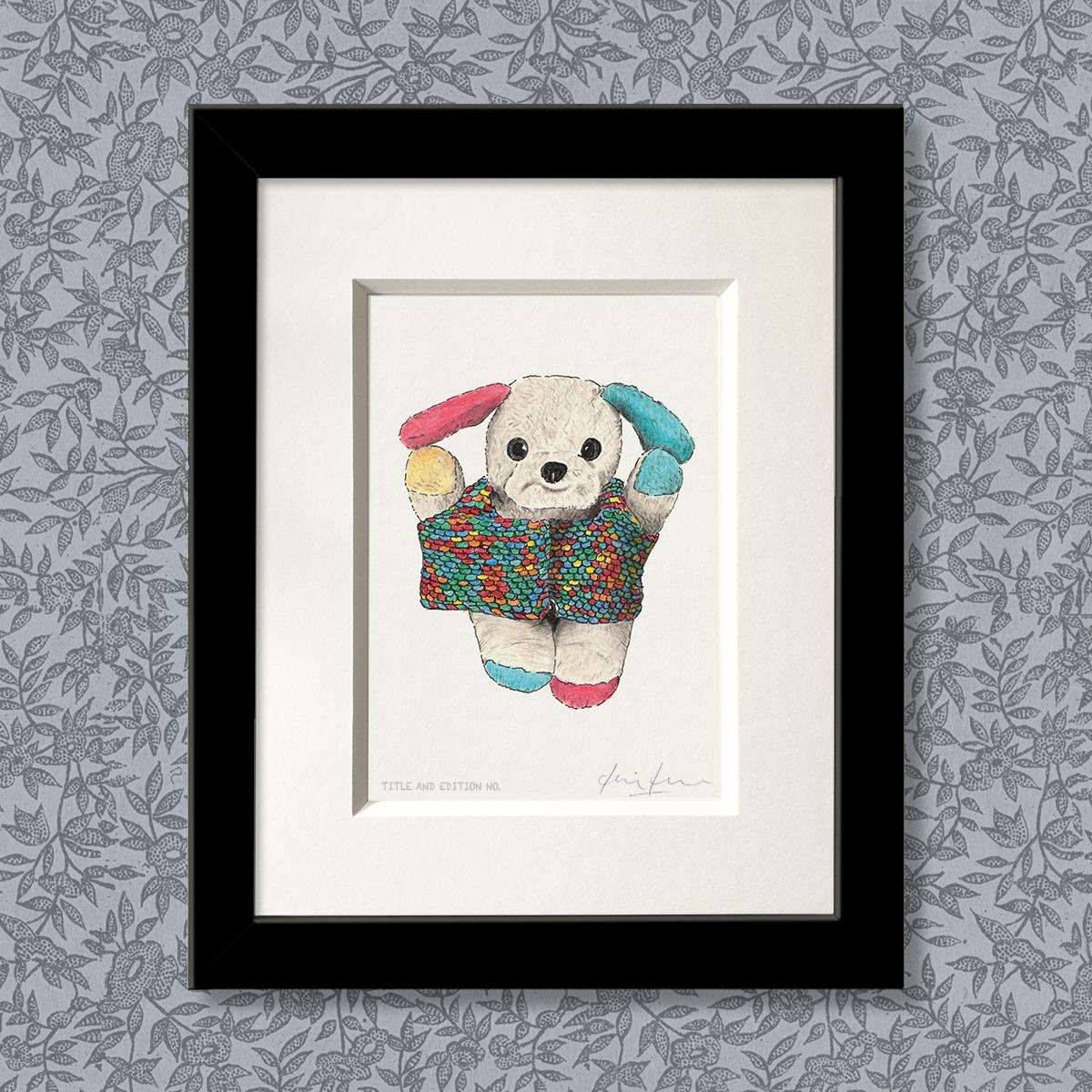Limited edition print from a pen, ink and coloured pencil drawing of a soft toy in a knitted sweater in a black frame