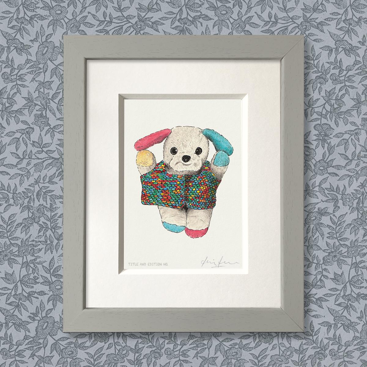 Limited edition print from a pen, ink and coloured pencil drawing of a soft toy in a knitted sweater in a grey frame