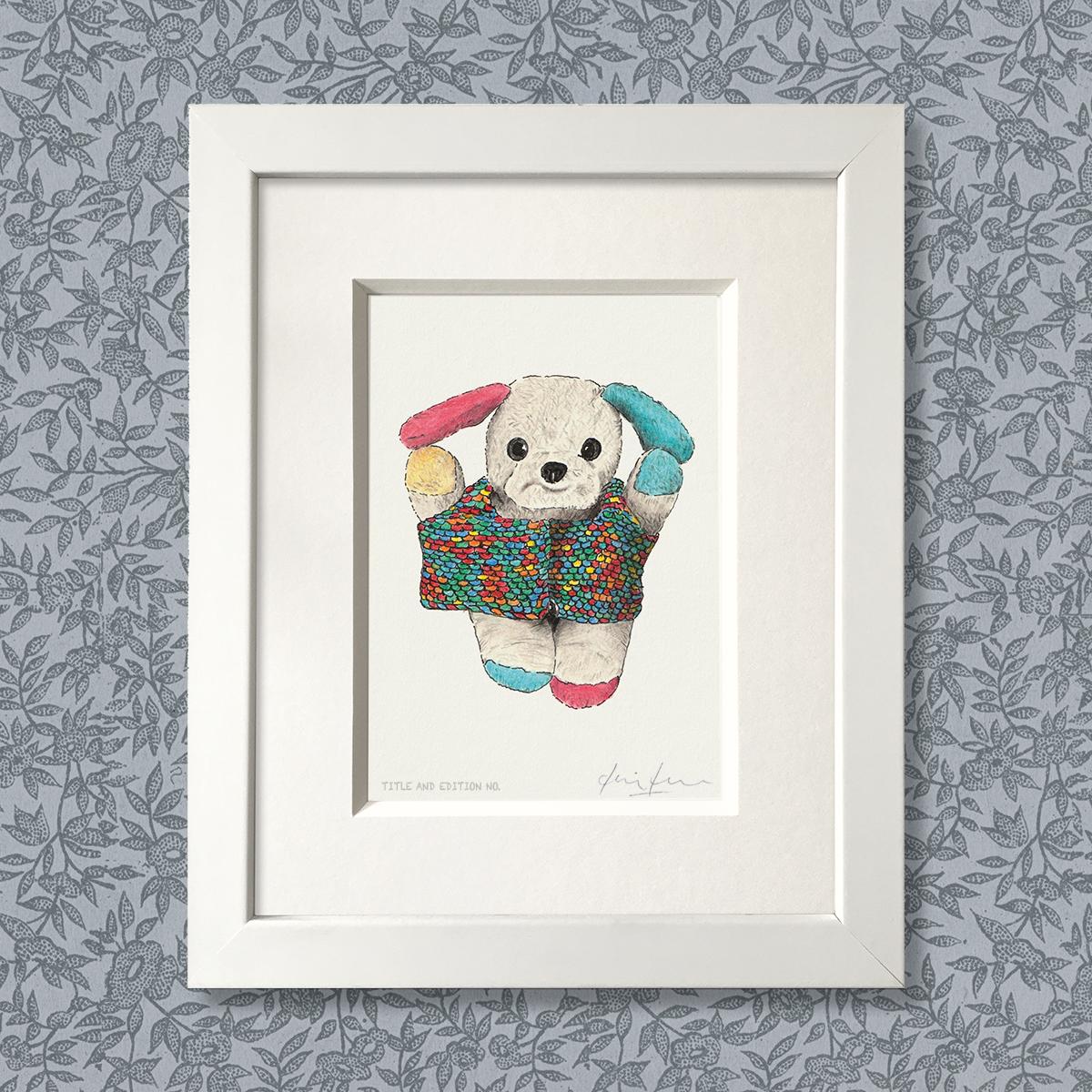 Limited edition print from a pen, ink and coloured pencil drawing of a soft toy in a knitted sweater in a white frame