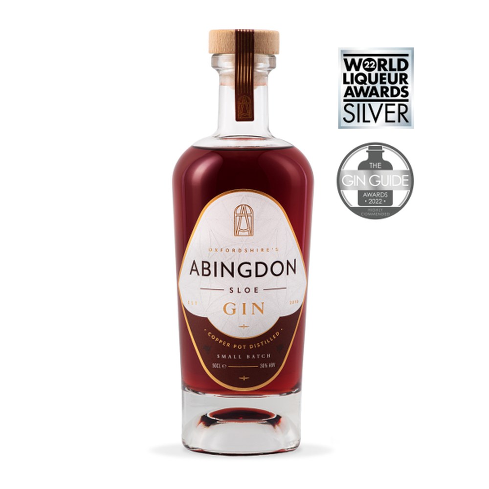 "Handcrafted Sloe Gin made from wild-foraged sloe berries, showcasing a vibrant ruby-red colour and rich, jammy flavour."