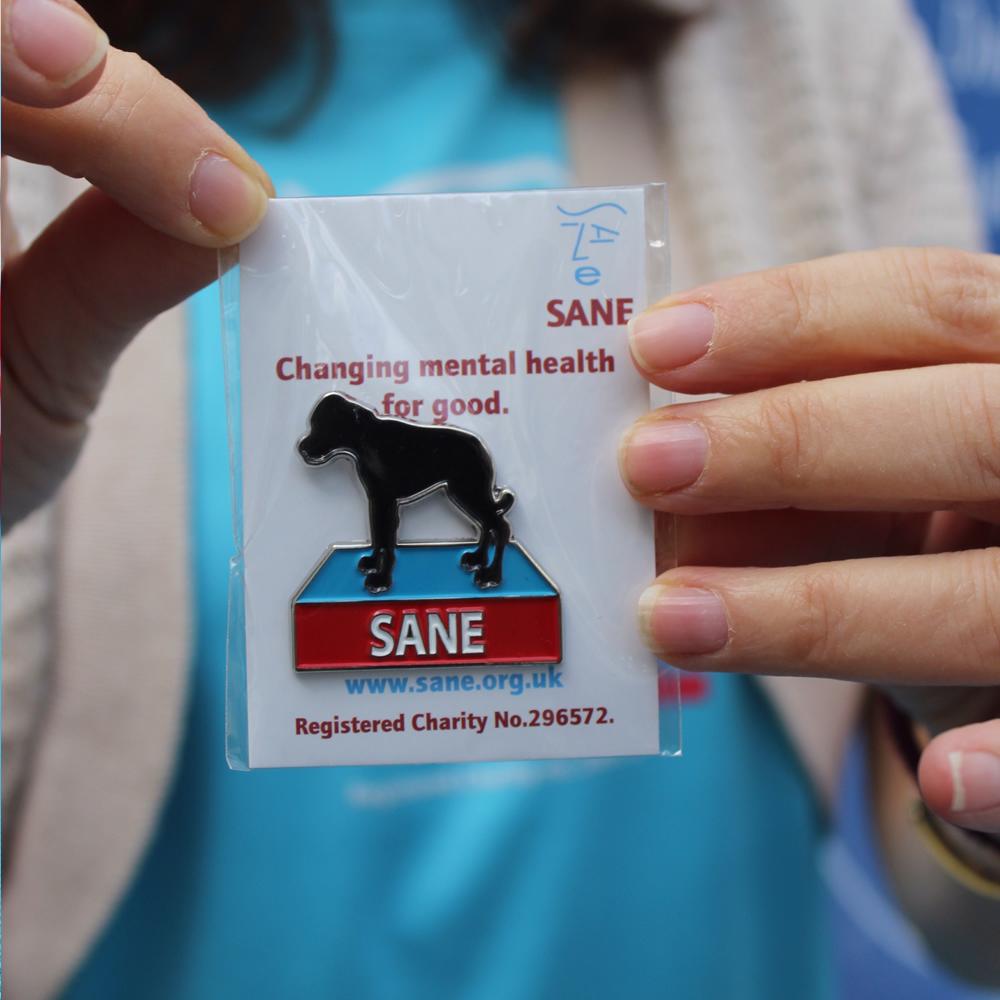 SANE Black Dog Pin Badge