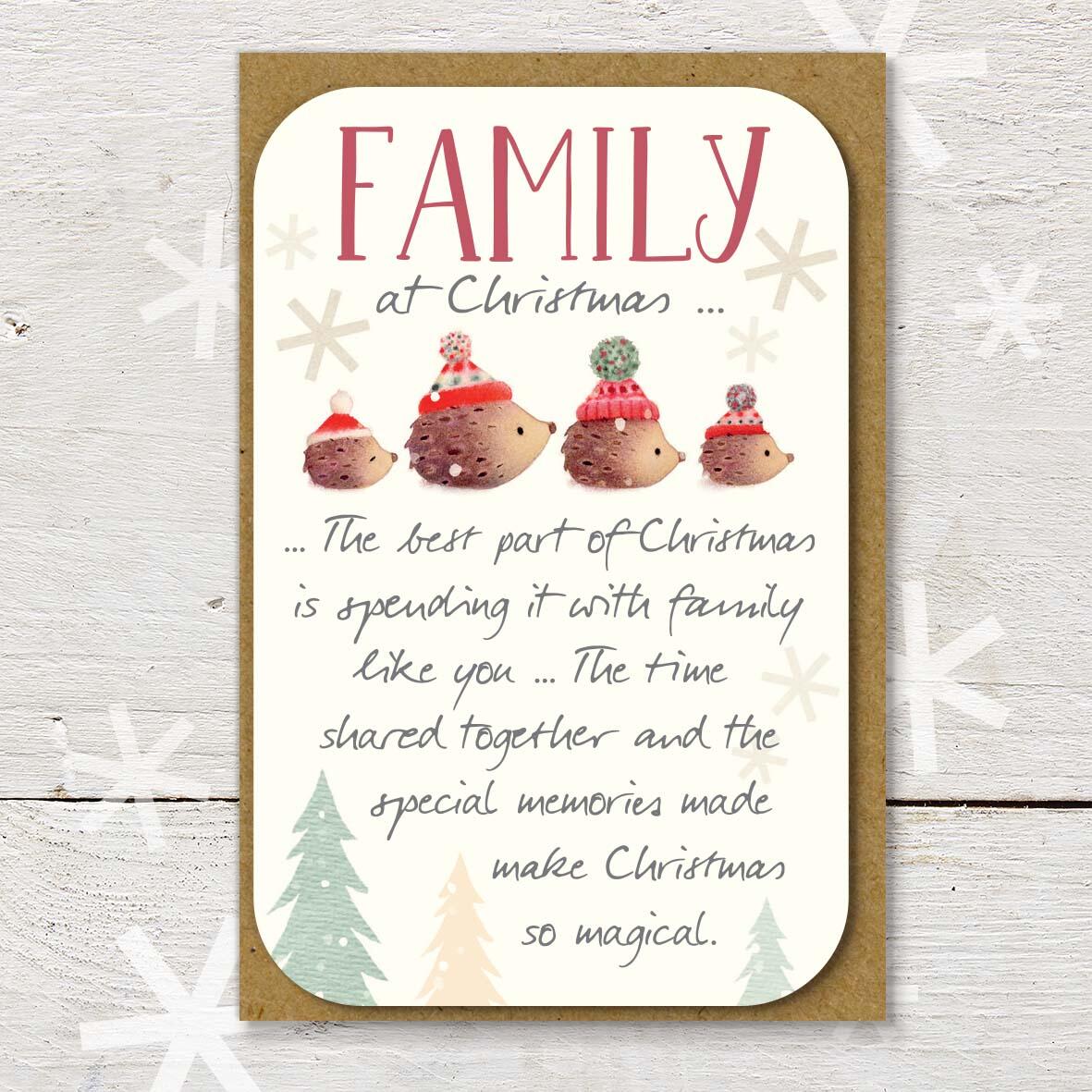 Christmas keepsake card with a ‘Family at Christmas’ caption, featuring a hedgehog family wearing woolly hats and a lovely little Christmas verse.