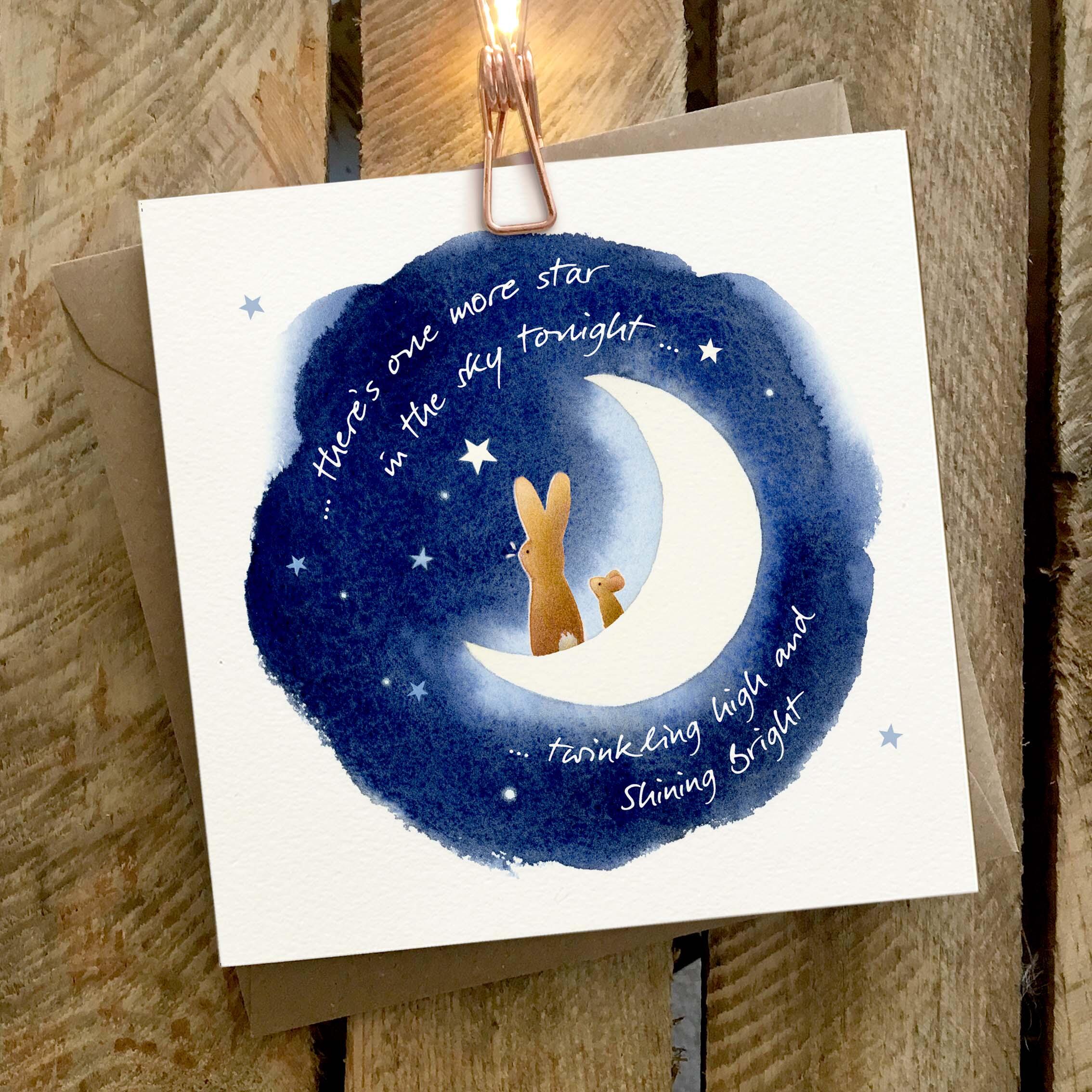 Greetings card featuring a mouse on a moonlit hill.