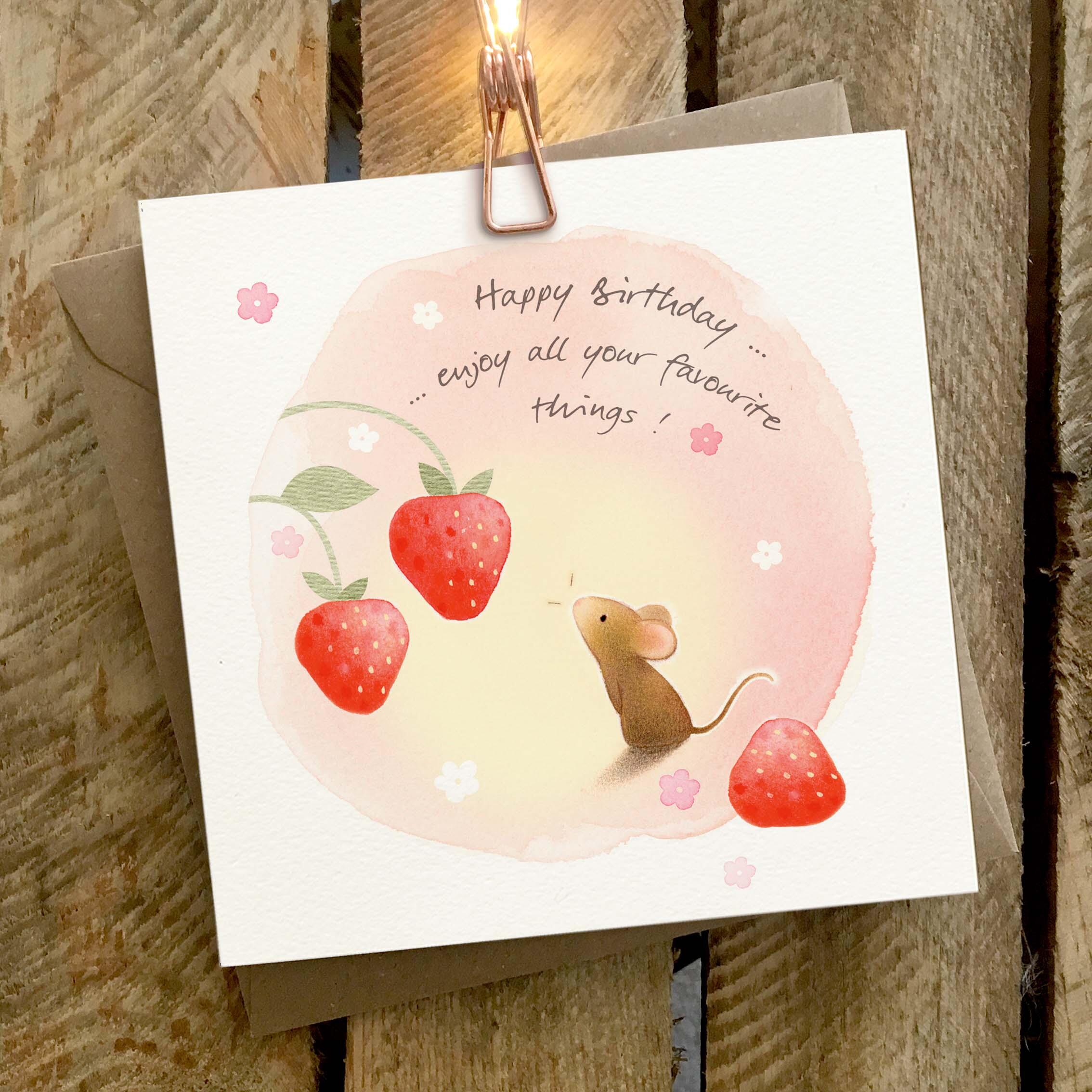 Greetings card featuring a mouse with strawberries.