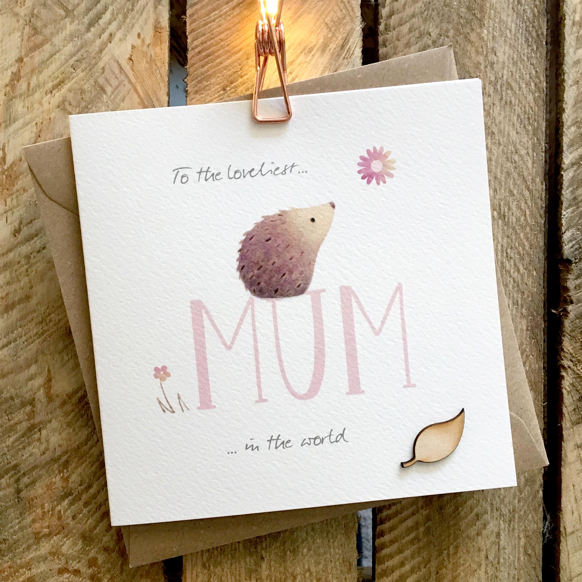 Card featuring a cute hedgehog sitting on top of large MUM caption