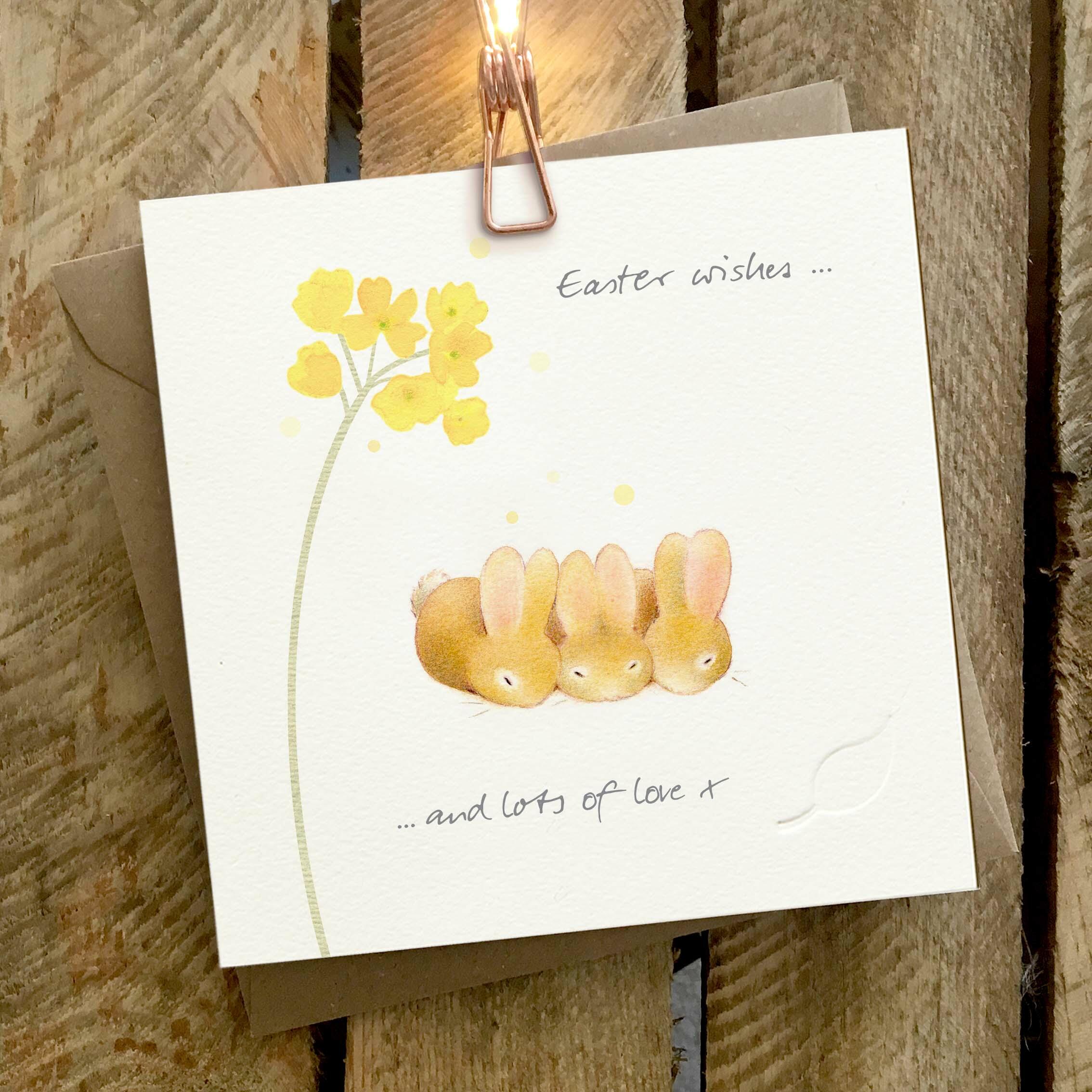 Card featuring three cute baby rabbits, with a 'Easter Wishes… and Lots of Love’ caption.