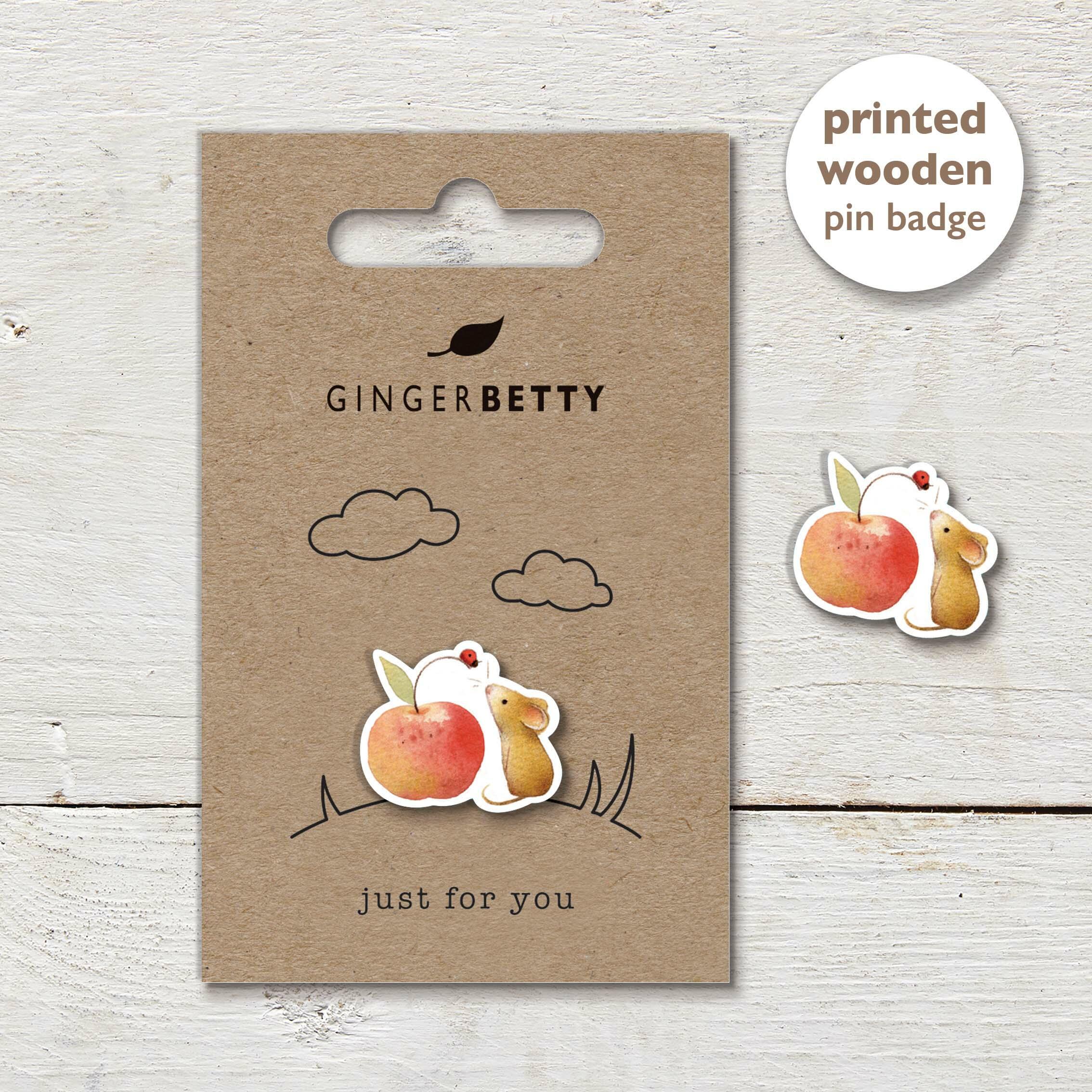 Mouse & apple pin badge with a line illustration and ‘Just for Ewe’ caption.