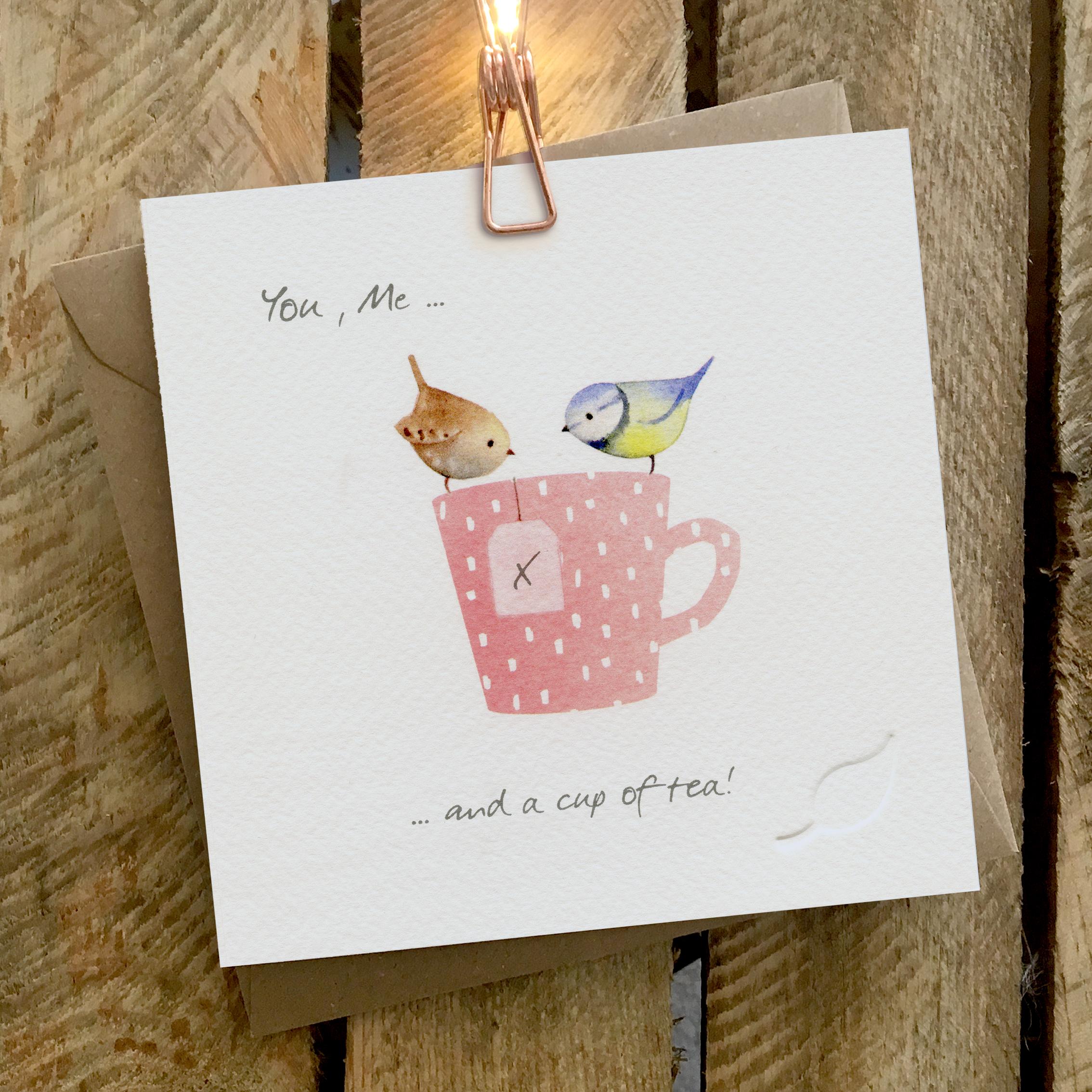 Card featuring two little birds sitting on top of a cup of tea