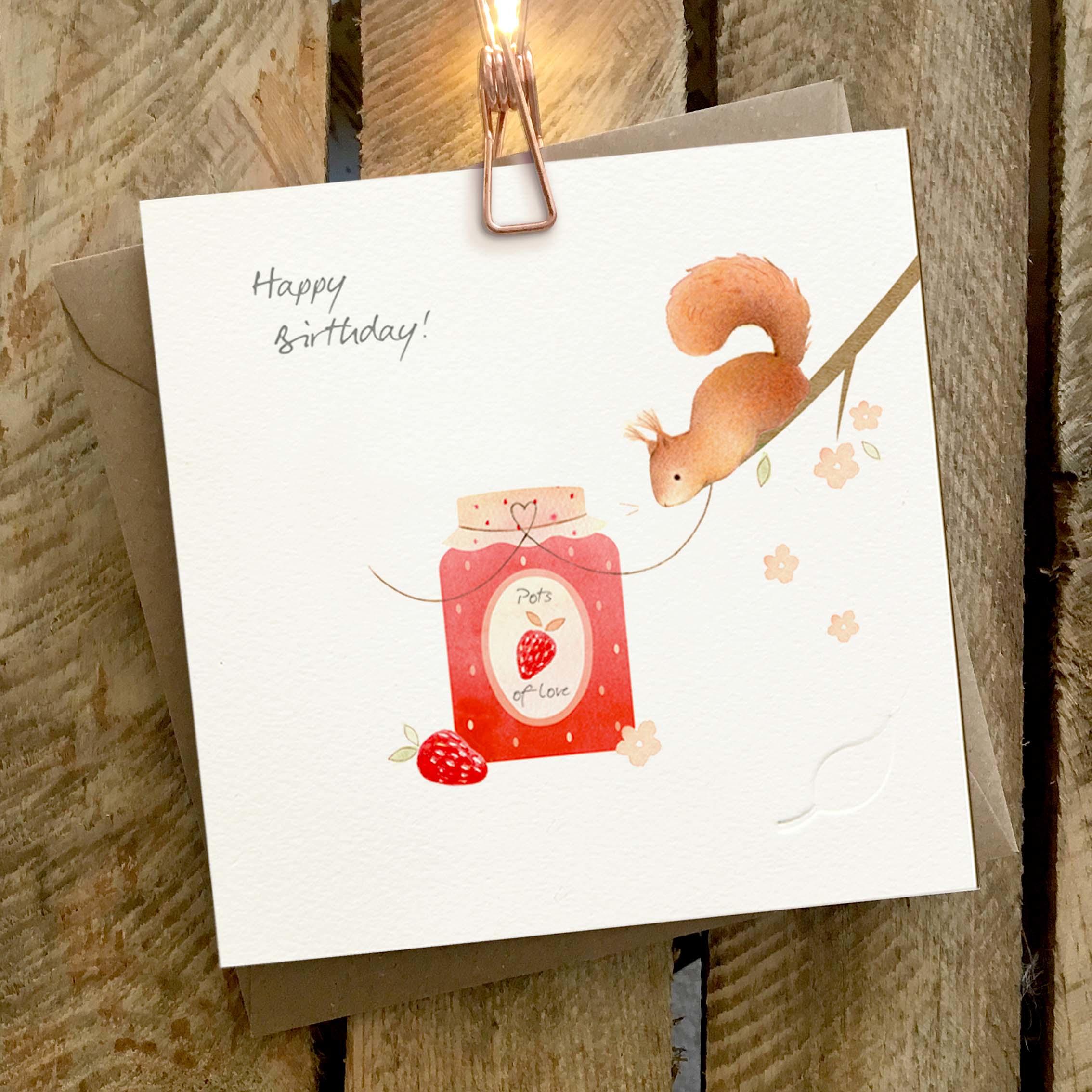 Card featuring cute red squirrel with a jar of strawberry jam.