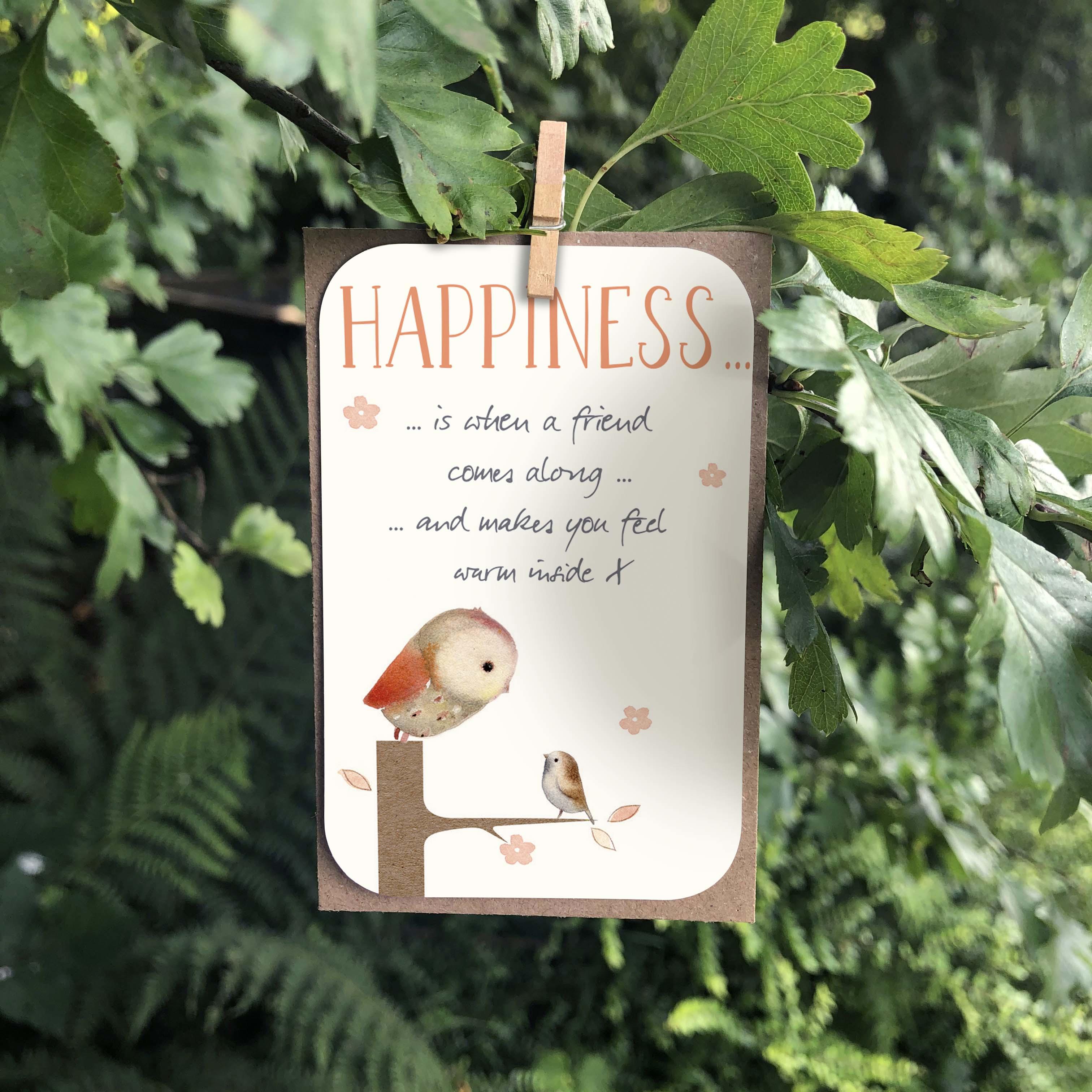 A small keepsake card with an “Happiness” caption. Features a cute illustrated owl and tiny sparrow.