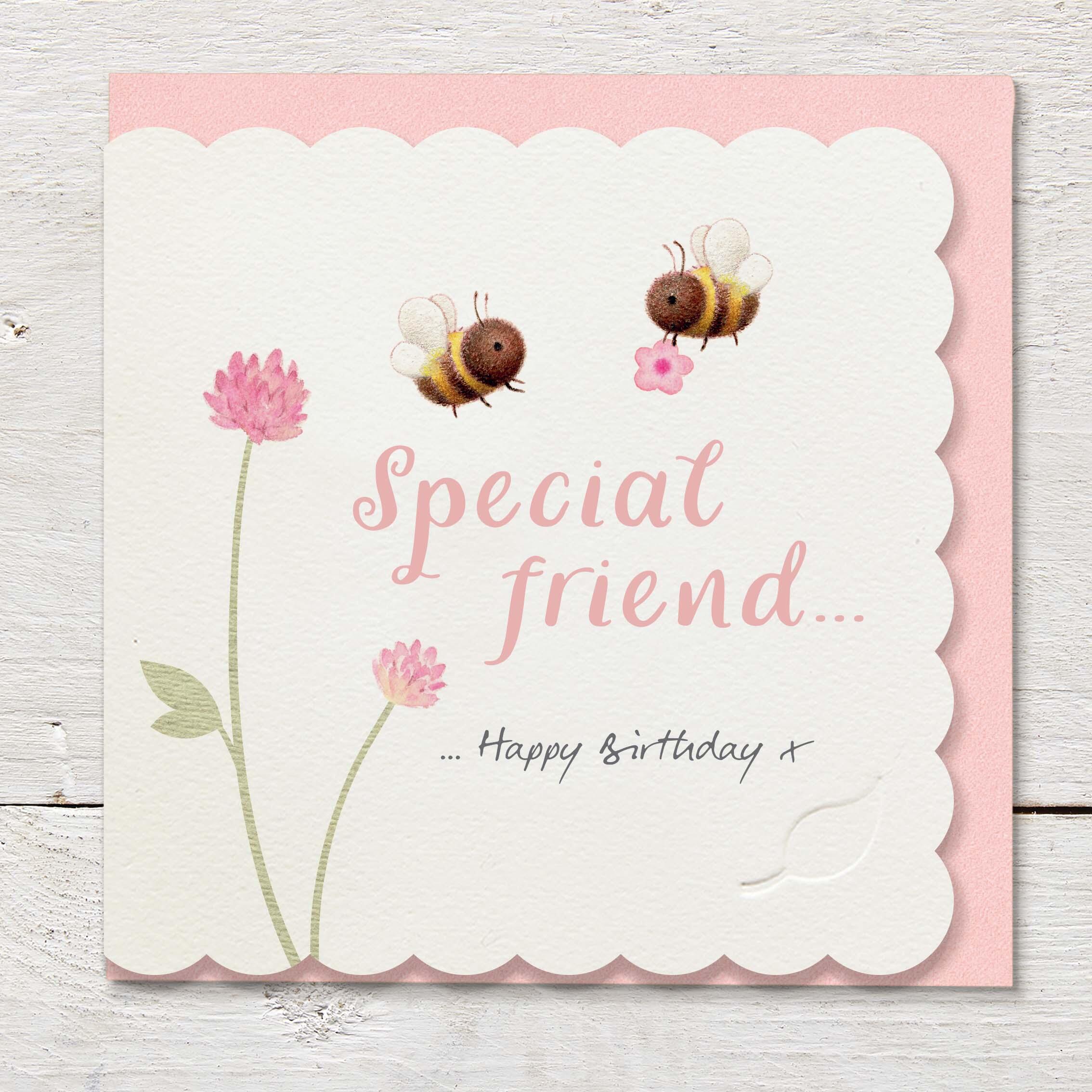 Die cut cardfeaturing pink clover flowers and a couple of cute bumble bees.