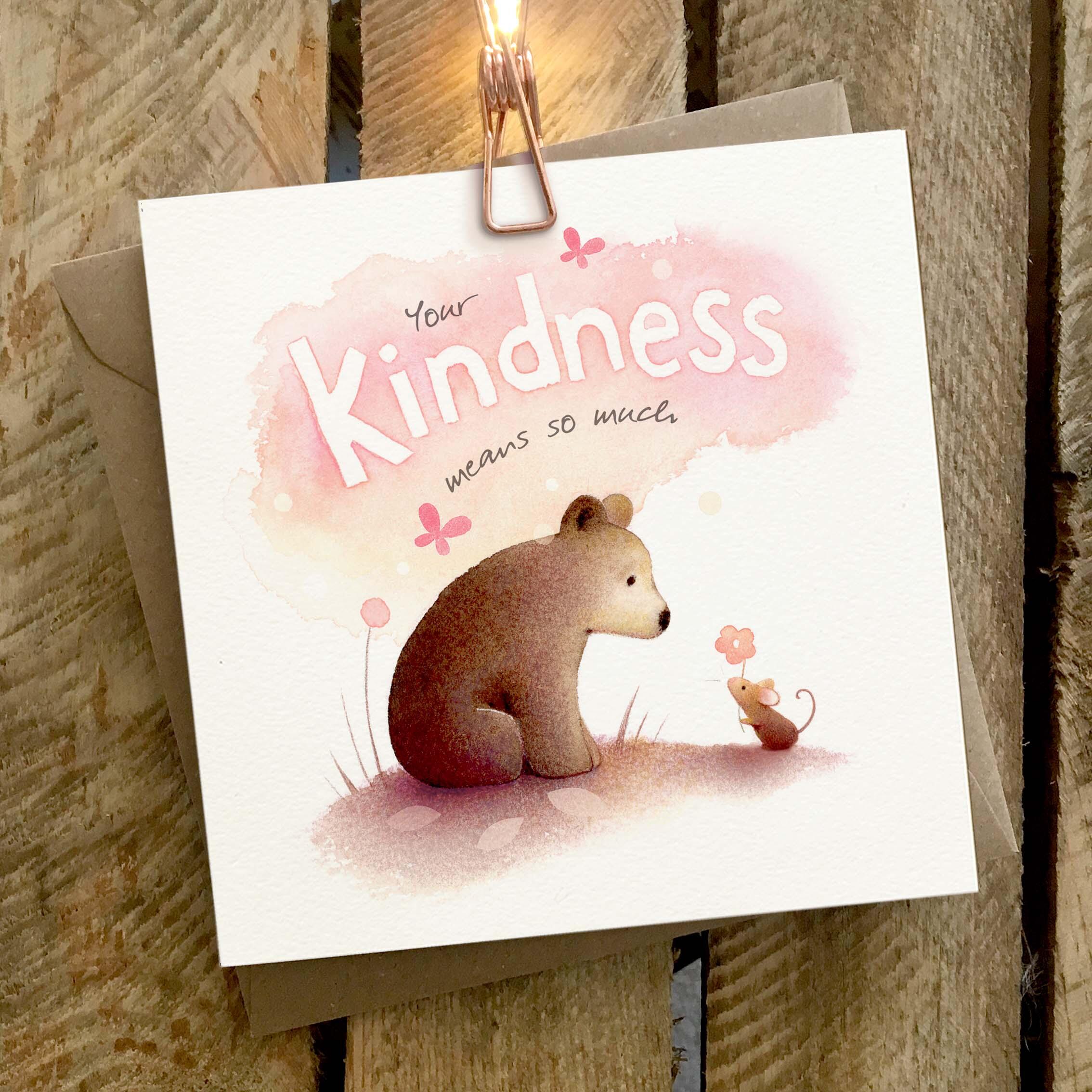Greetings card featuring a brown bear and mouse.
