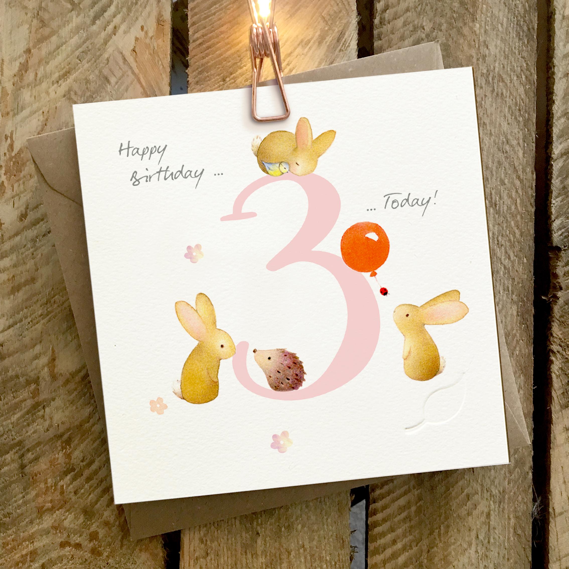 Card featuring three little rabbits with a large pink number 3