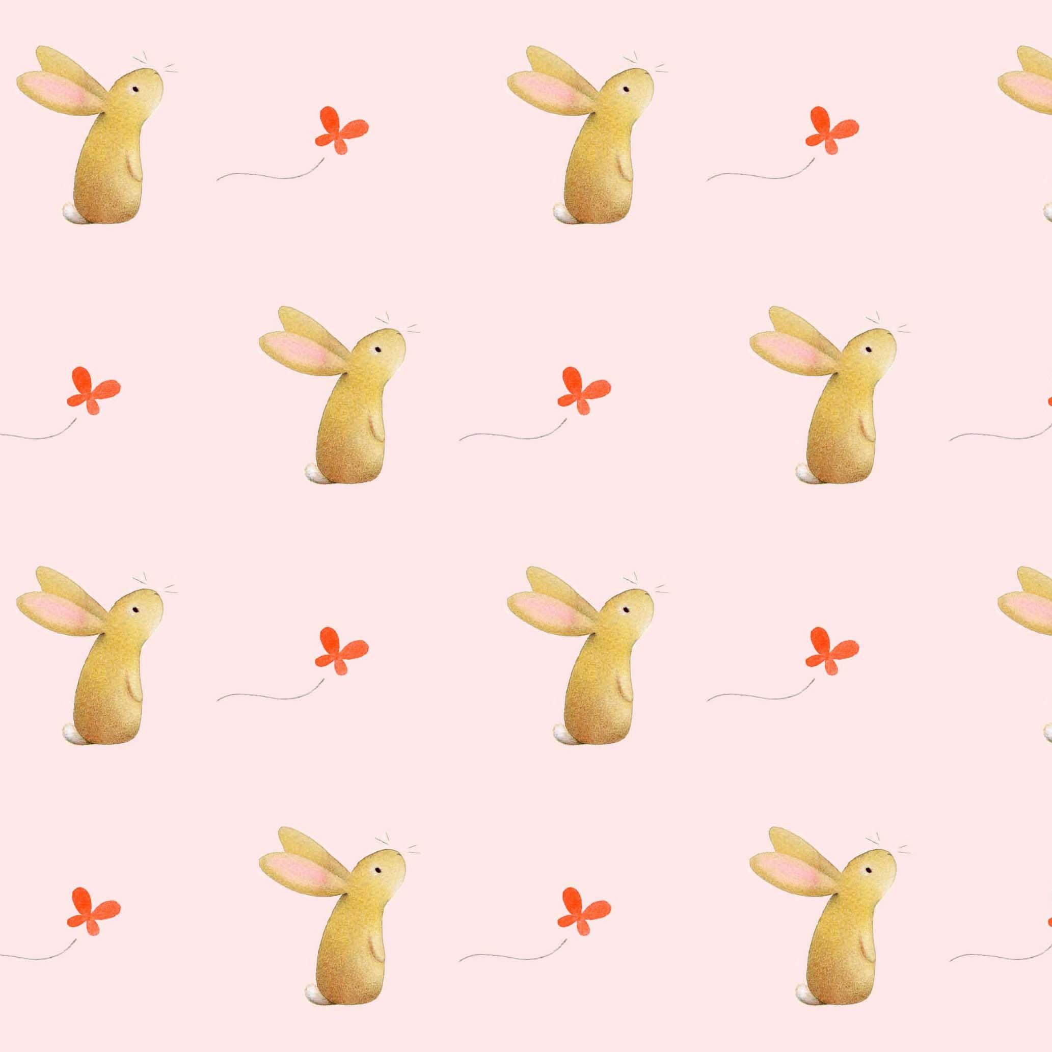 Gift Wrap featuring cute rabbit and a butterfly on a pale peach coloured wrap.
