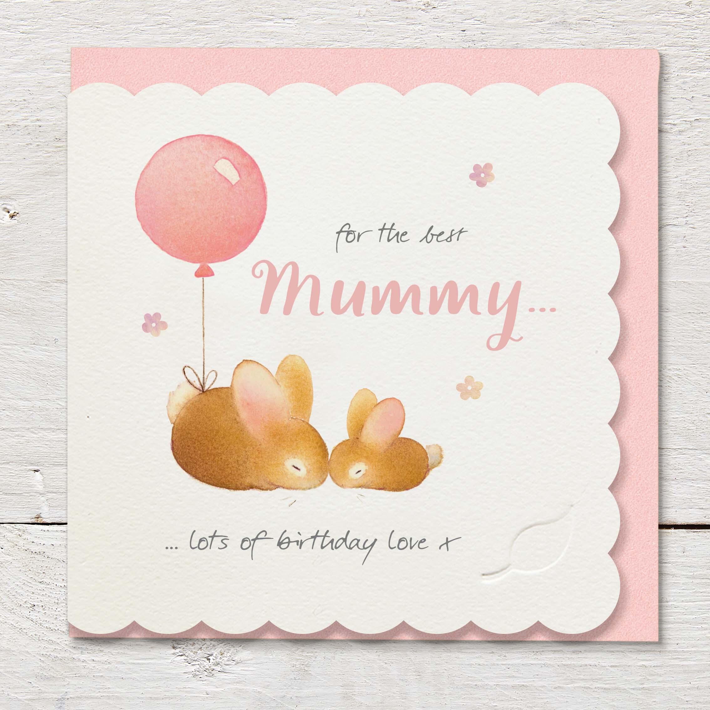 Die cut cardfeaturing mummy and baby rabbits with a large pink balloon.