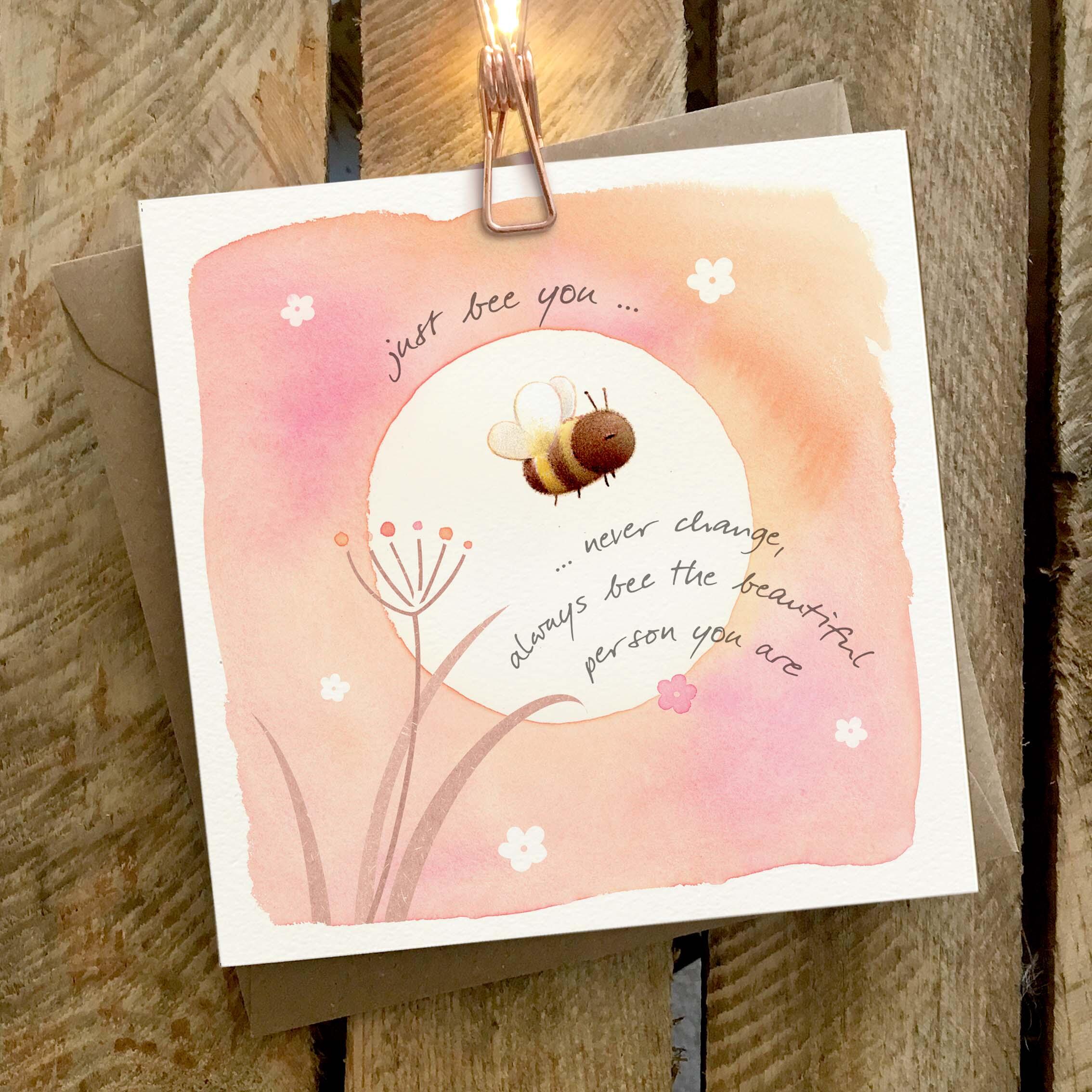 Greetings card featuring a bumble bee and sunshine.