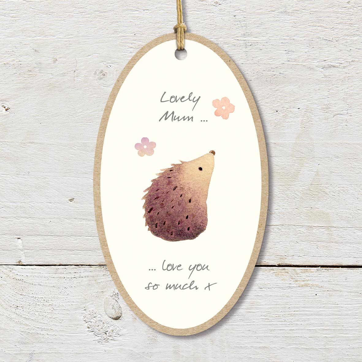 Large Wooden Plaque featuring a cute hedgehog and flowers with a ’Lovely Mum… love you so much X’ caption.