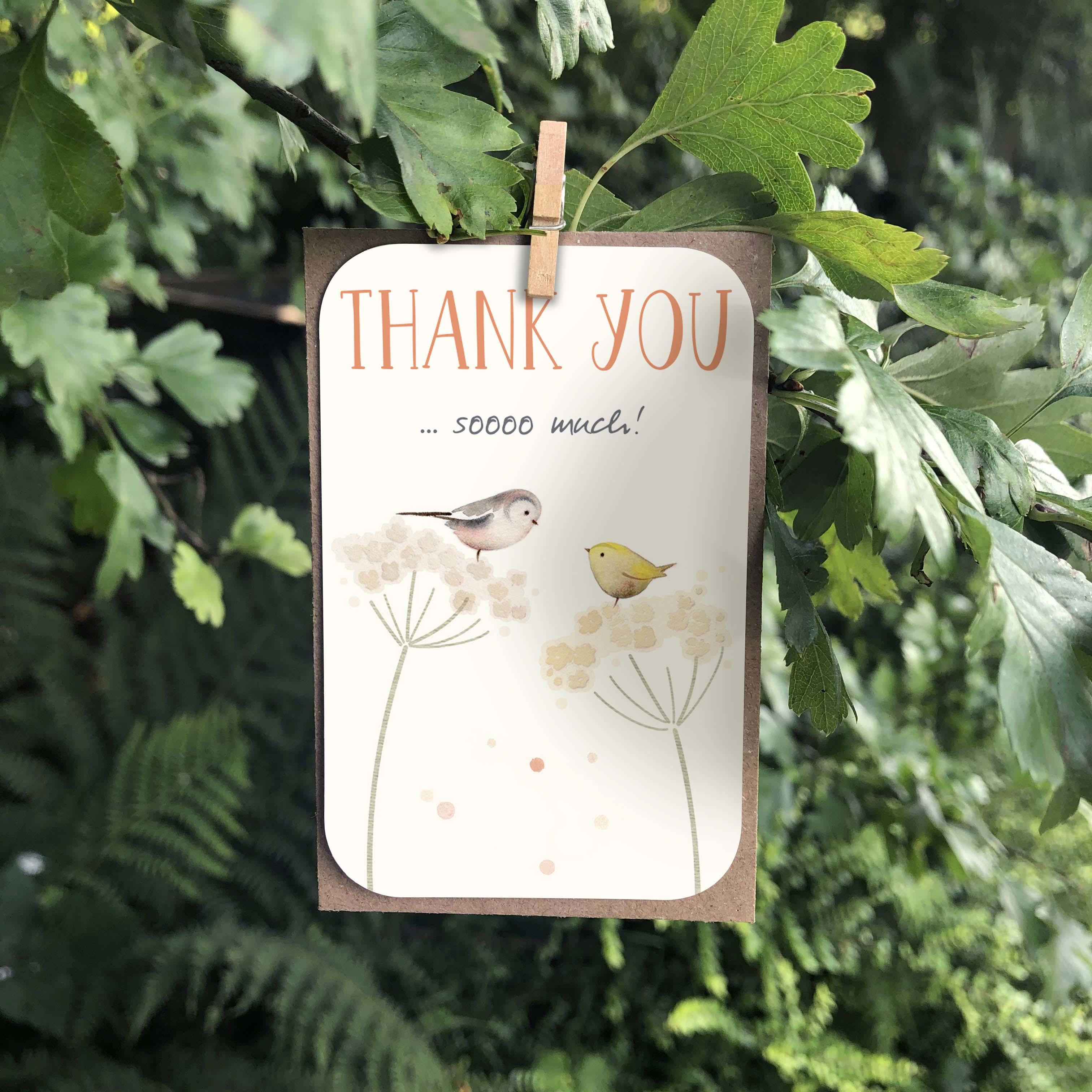 A small keepsake card with a “Thank You soooo much!” caption. Features an illustration of two cute birds sitting in hedgerow plants.