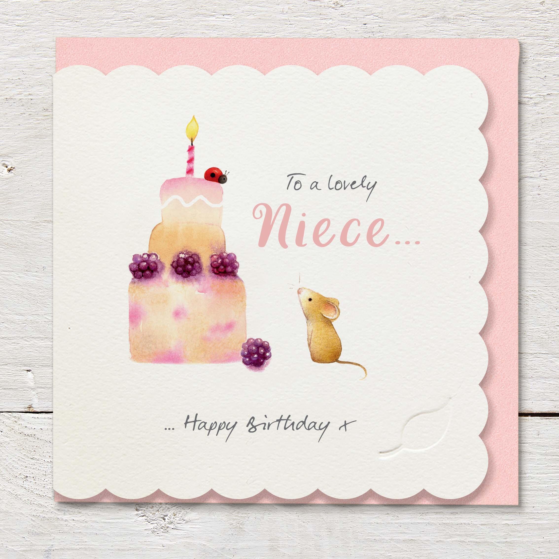 Die cut cardfeaturing a cute mouse with a large blackberry birthday cake.