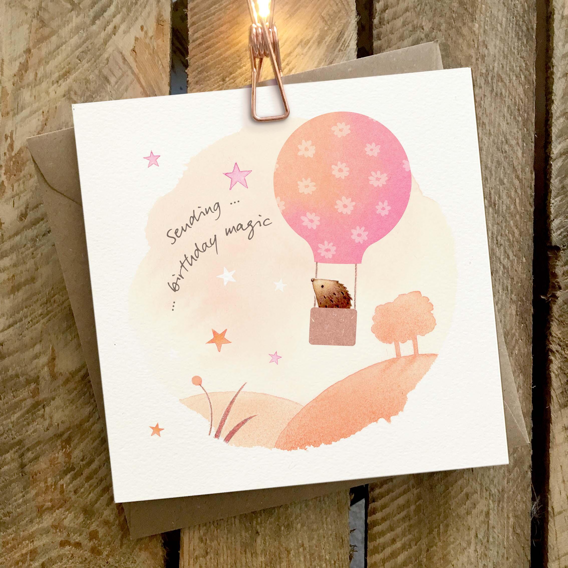 Greetings card featuring hedgehog in hot air balloon.