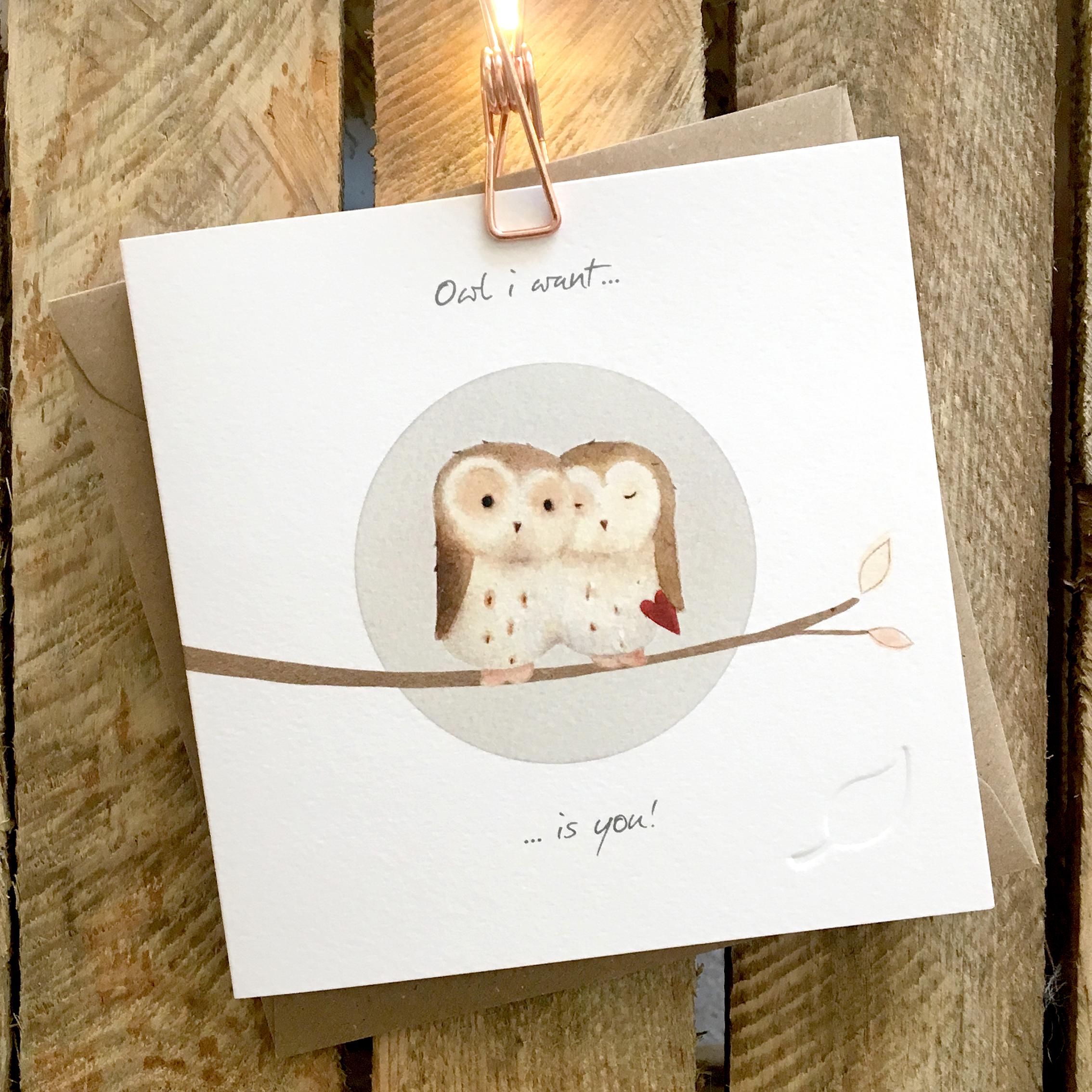 Card featuring two cute barn owls cuddled up on branch