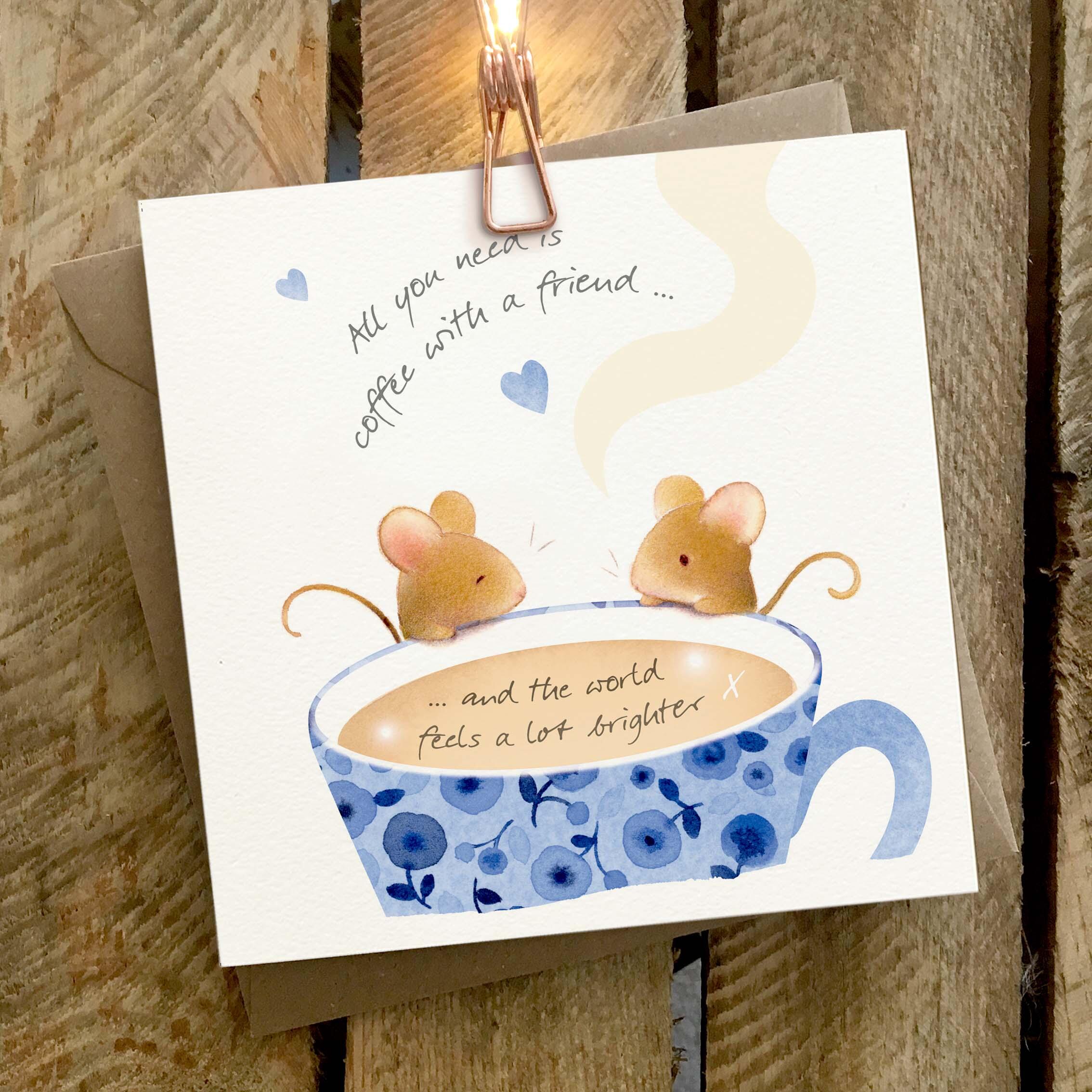 Greetings card featuring two ice on edge of tea cup.