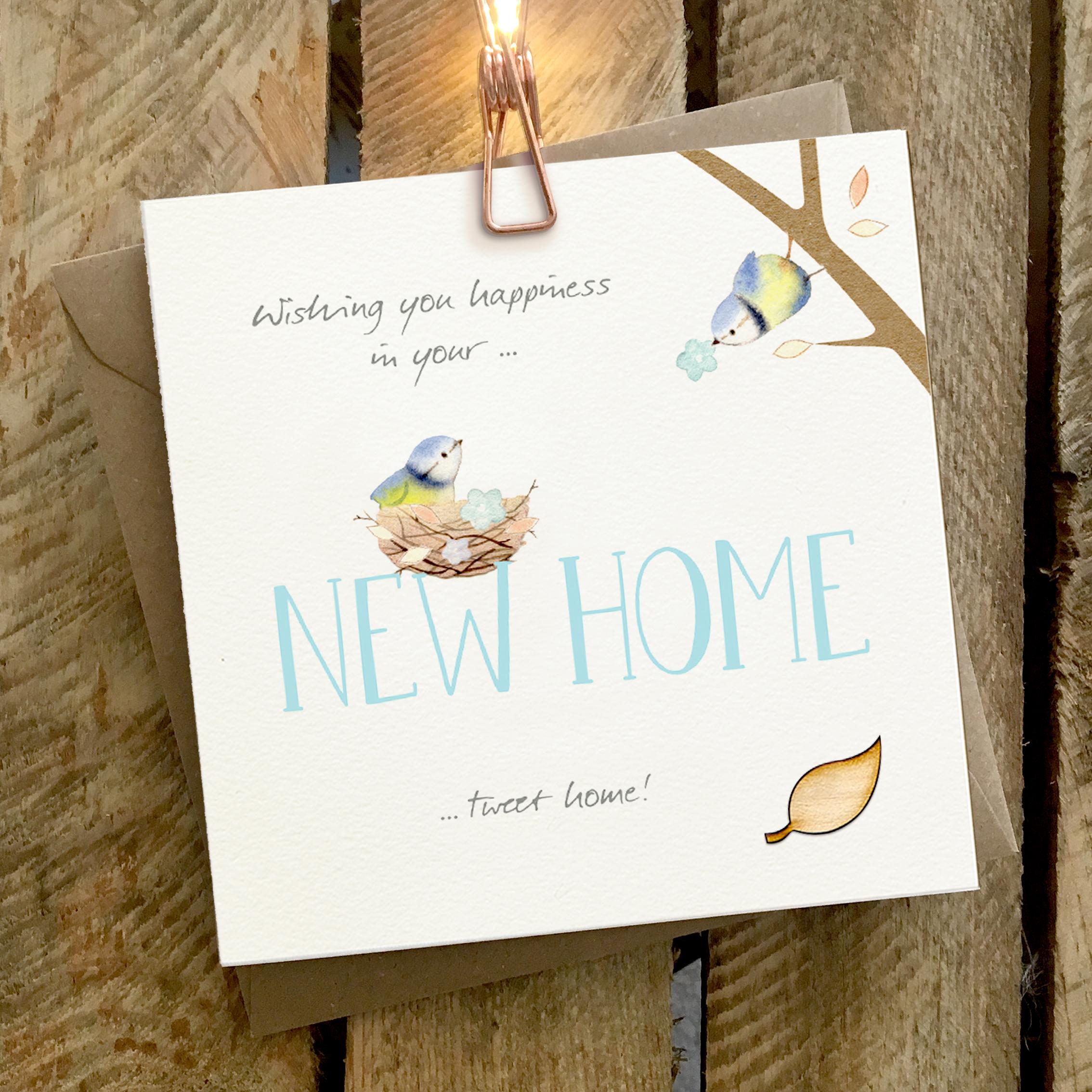 Card featuring two cute blue tits and a large NEW HOME caption