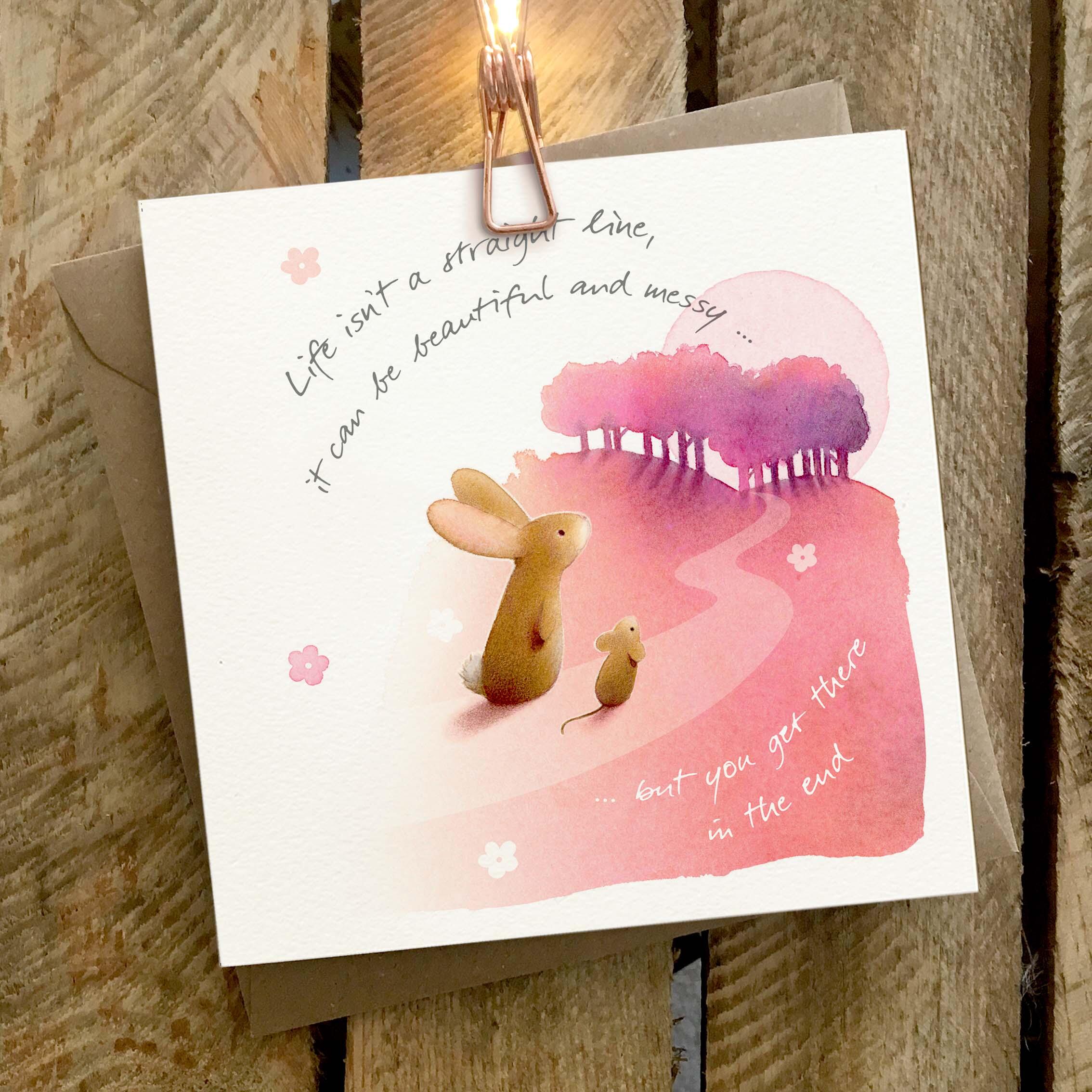Greetings card featuring a rabbit and mouse walking at sunset.
