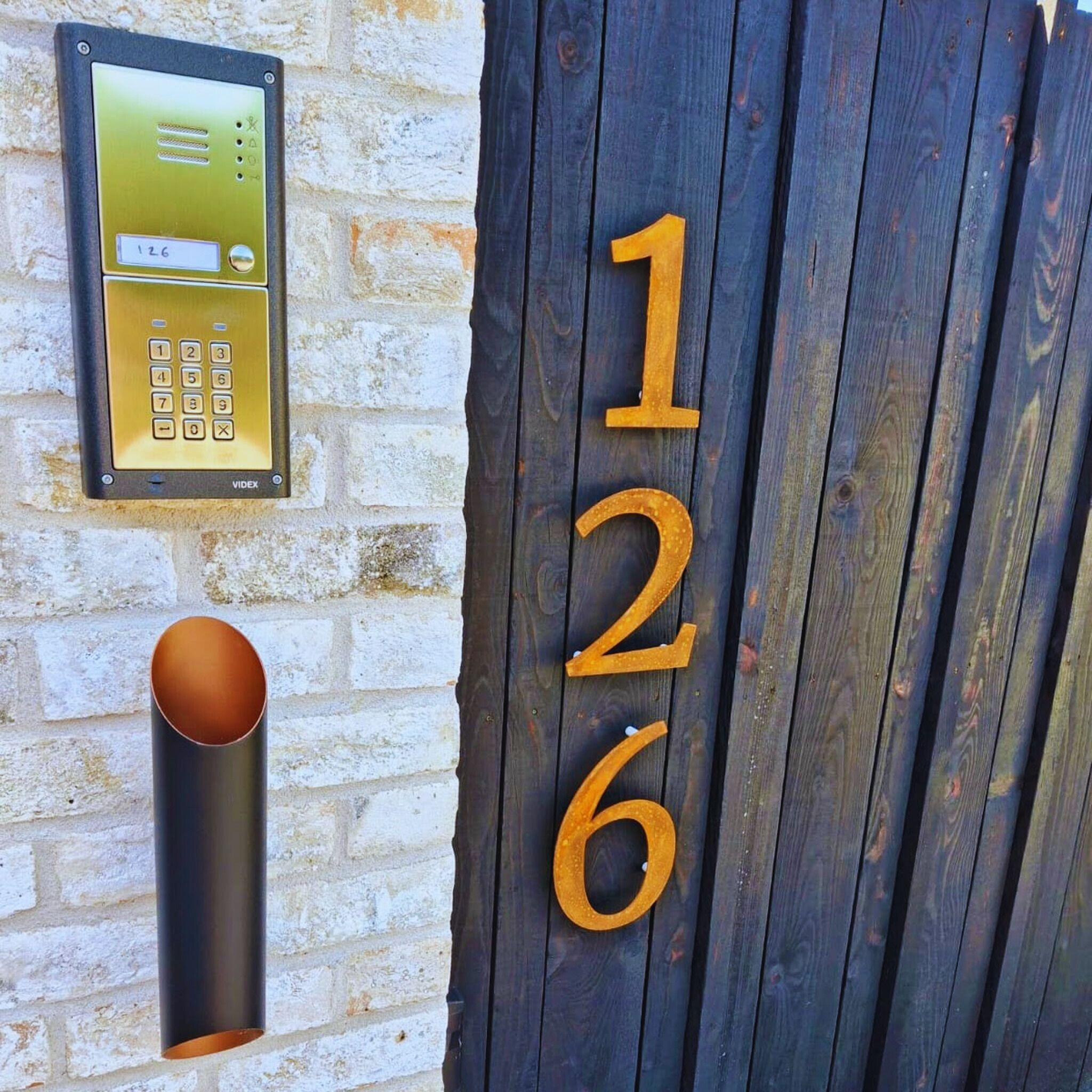 Floating corten house numbers