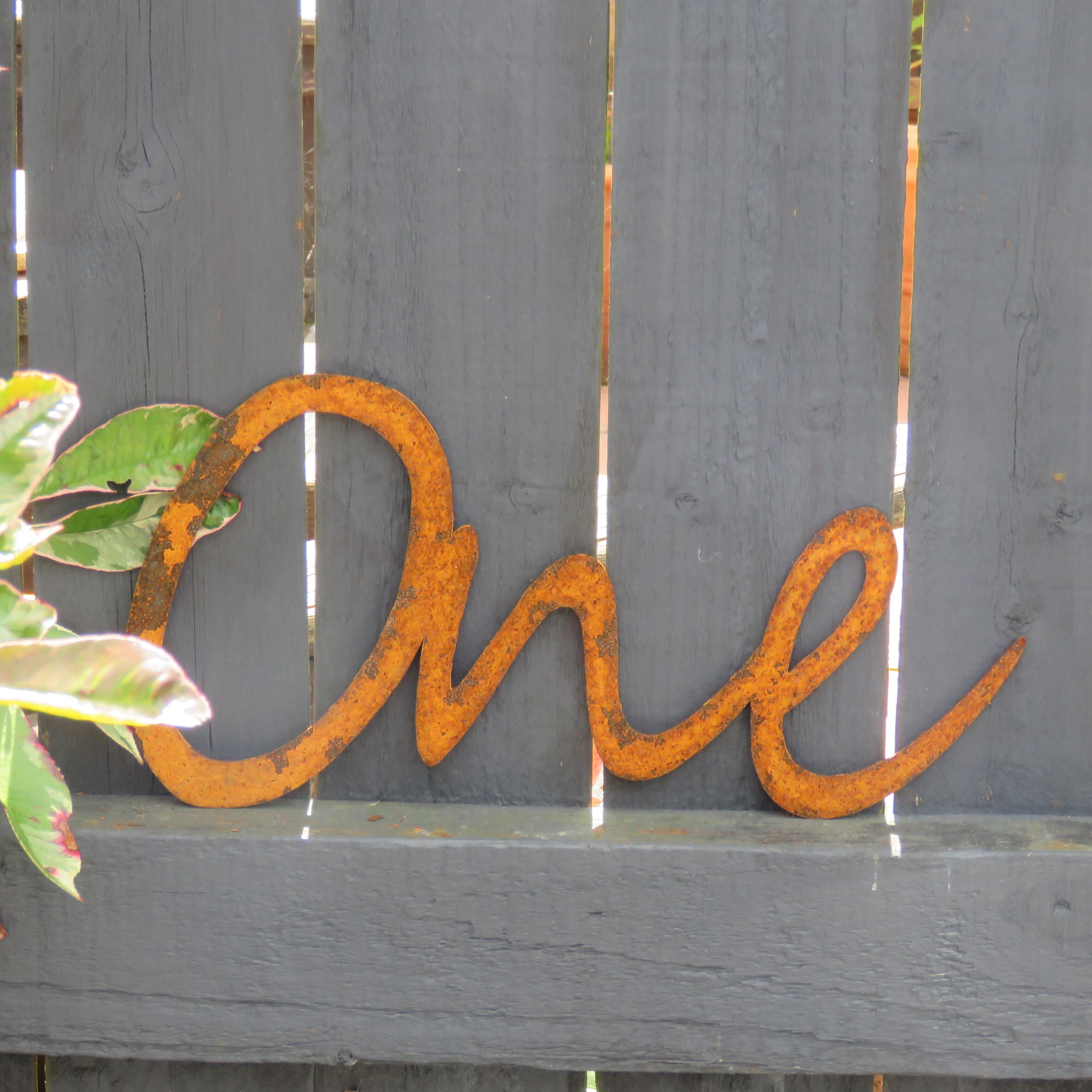 Handwritten metal sign