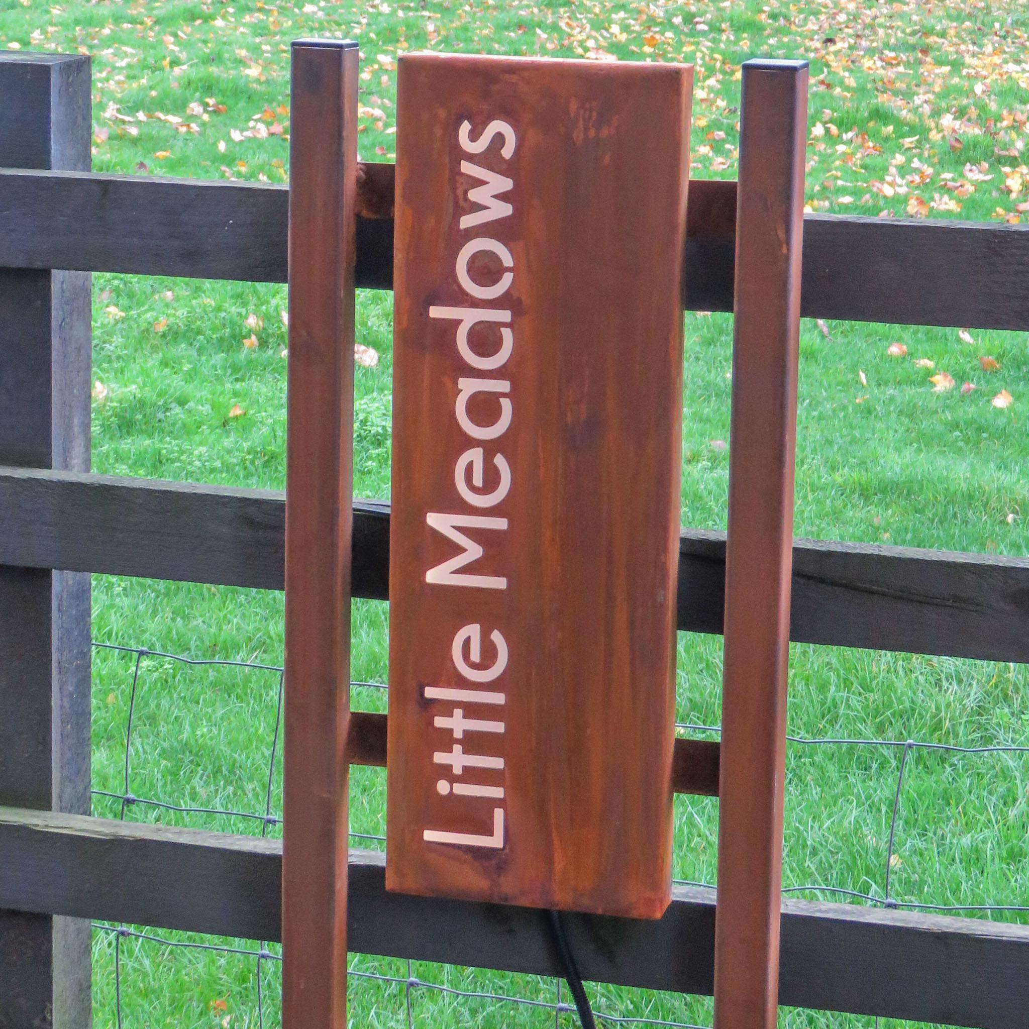 house signage made from corten steel